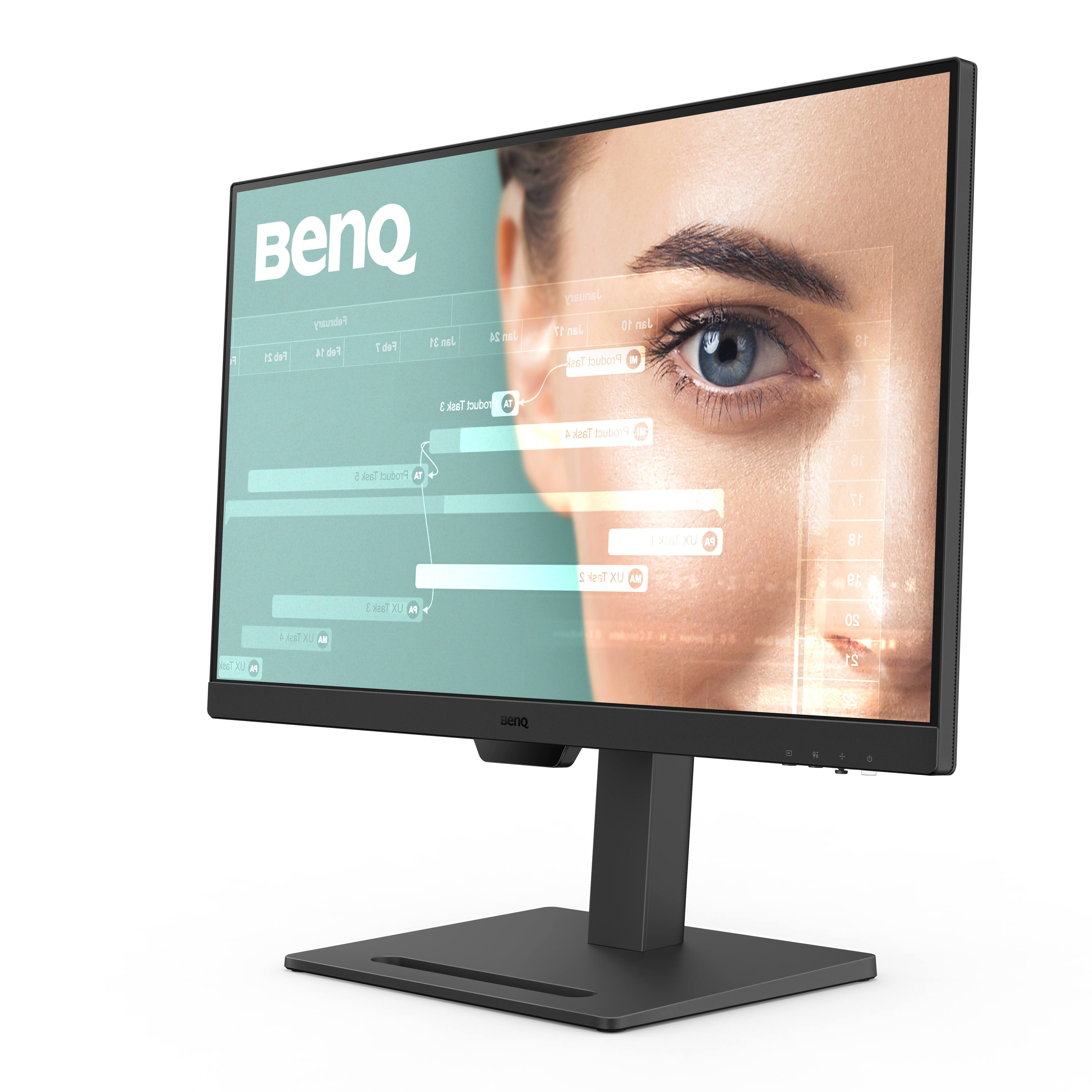 BenQ is a company that manufactures computer monitors and other electronic products. The image features a BenQ computer monitor, which is placed on a stand. The monitor is turned on and displaying a woman's face on its screen. The image suggests that the monitor is being used for a presentation or a product demonstration.