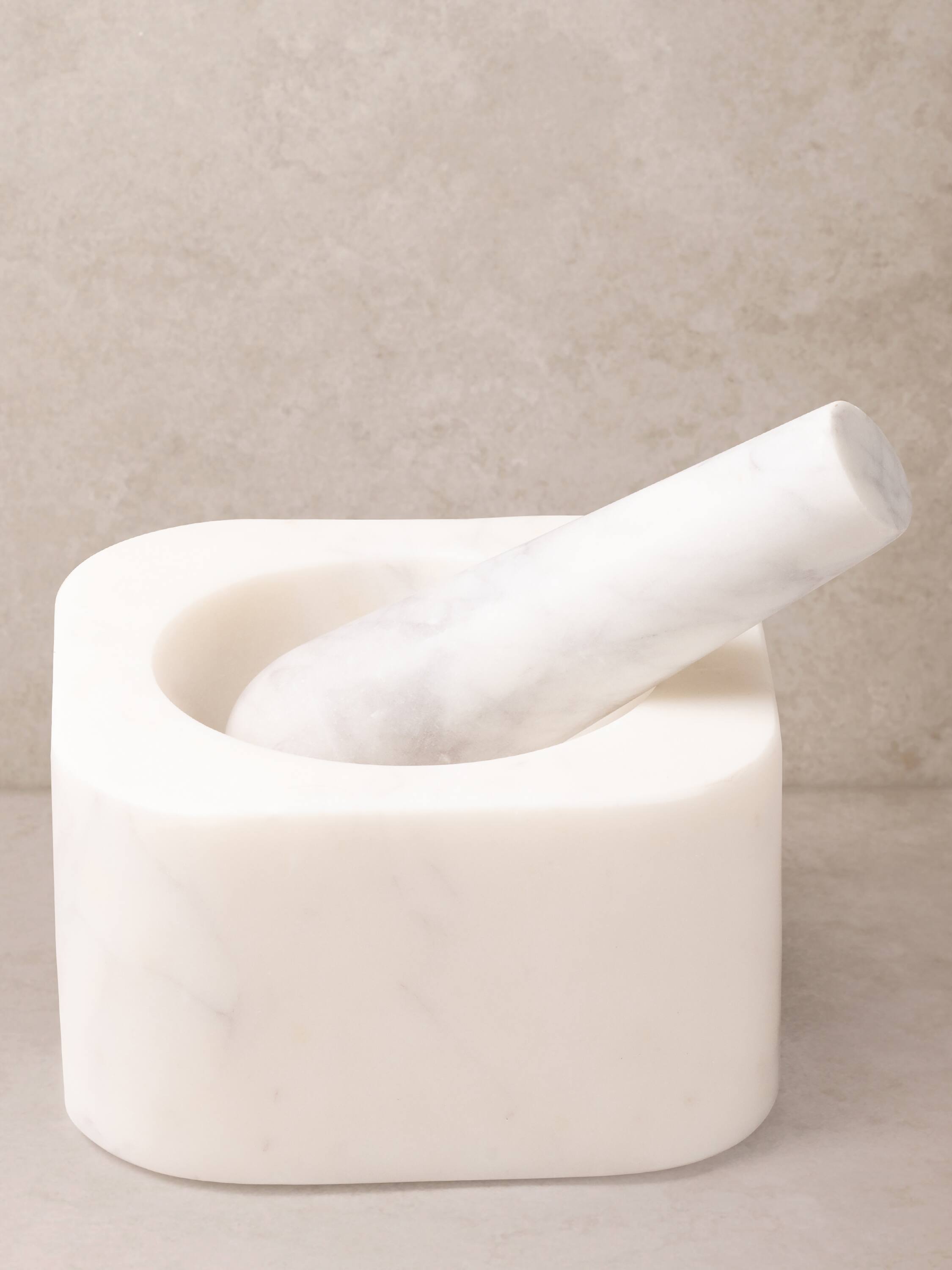 Front. GAURI KOHLI - Noble Mortar and Pestle - Shades of white.