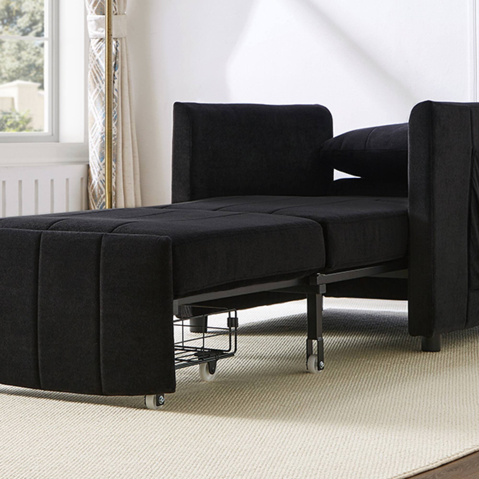Angle. GOODSILO - Convertible Sleeper Sofa with Adjustable Backrest and Storage, Upholstered in Soft Chenille Fabric - Black.