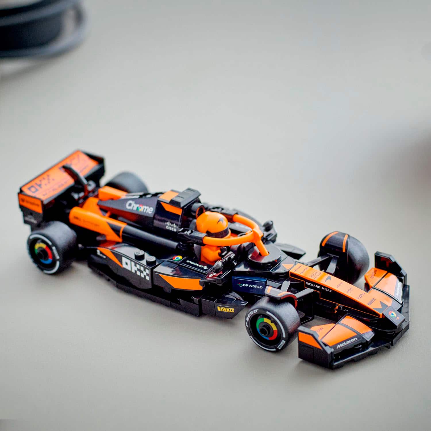 The text on the image reads "Vy Chrome Cisco - OpWorld Diwalts - Sero I P.M.A. - Alto I LN Mcaren - Garage."