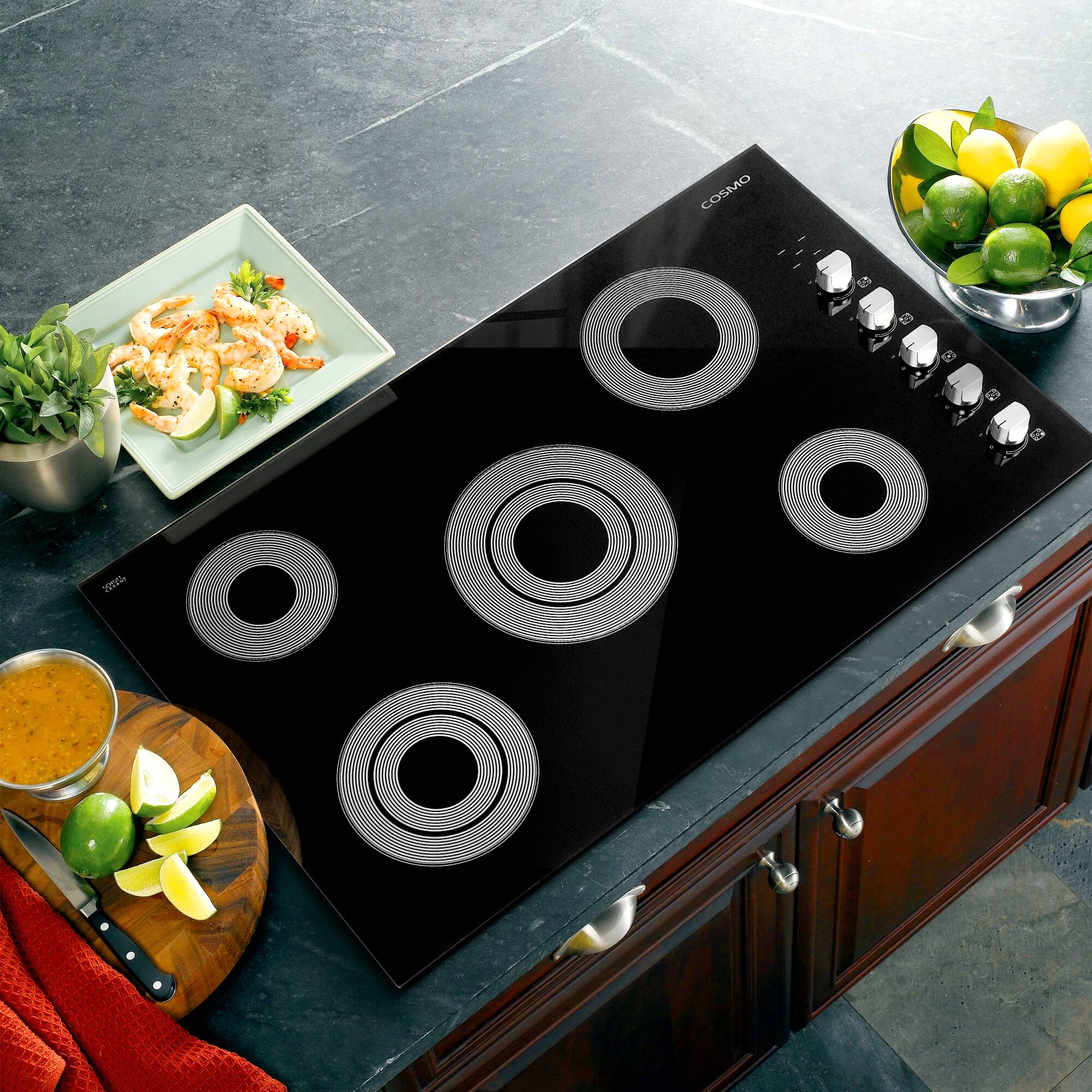 Angle. COSMO - COS-365ECC 36 in. Electric Ceramic Glass Cooktop with 5 Burners, Hot Surface Indicator Light and Control Knobs - Black.