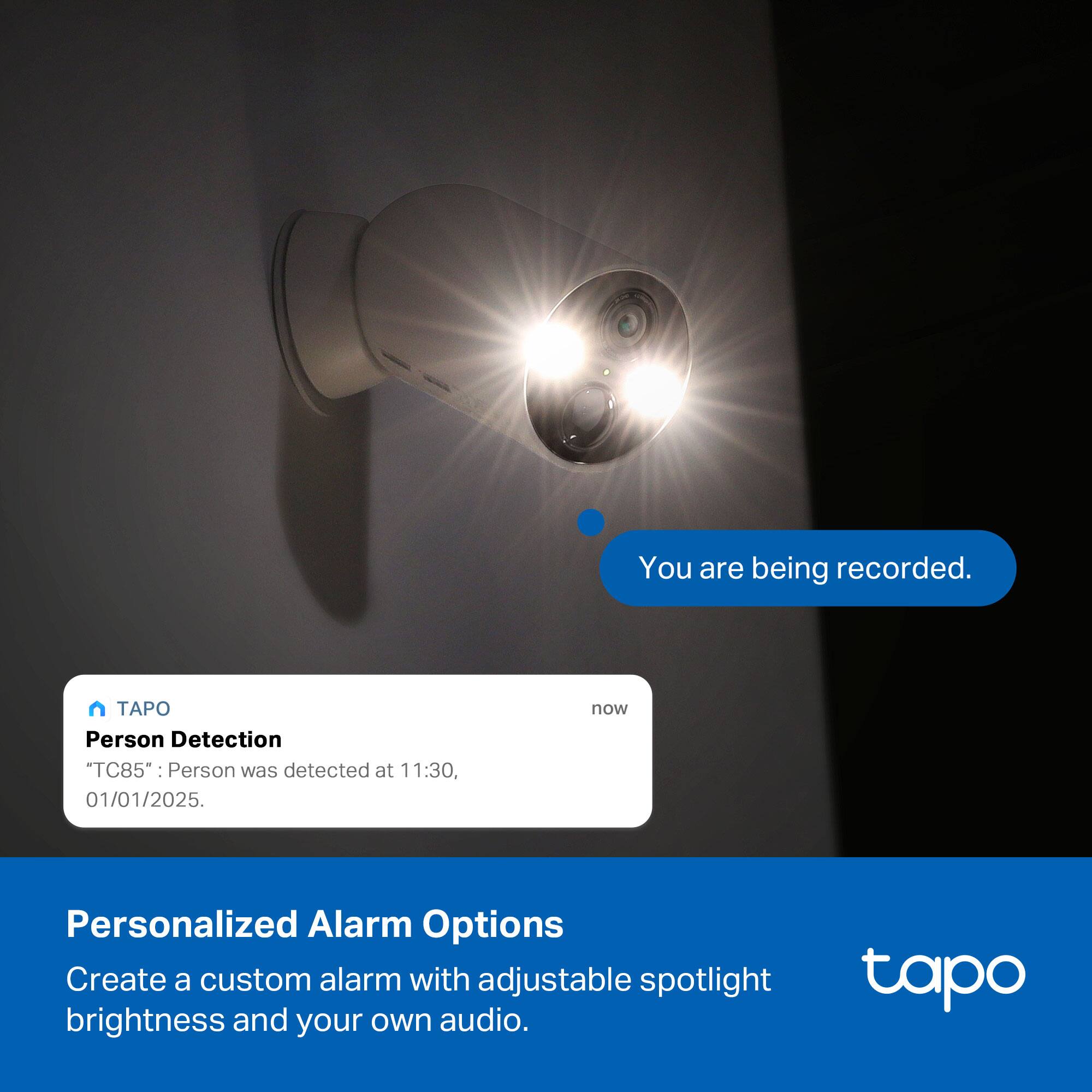 You are being recorded.

Person Detection  
"TC85": Person was detected at 11:30, 01/01/2025.

Personalized Alarm Options  
Create a custom alarm with adjustable spotlight brightness and your own audio.