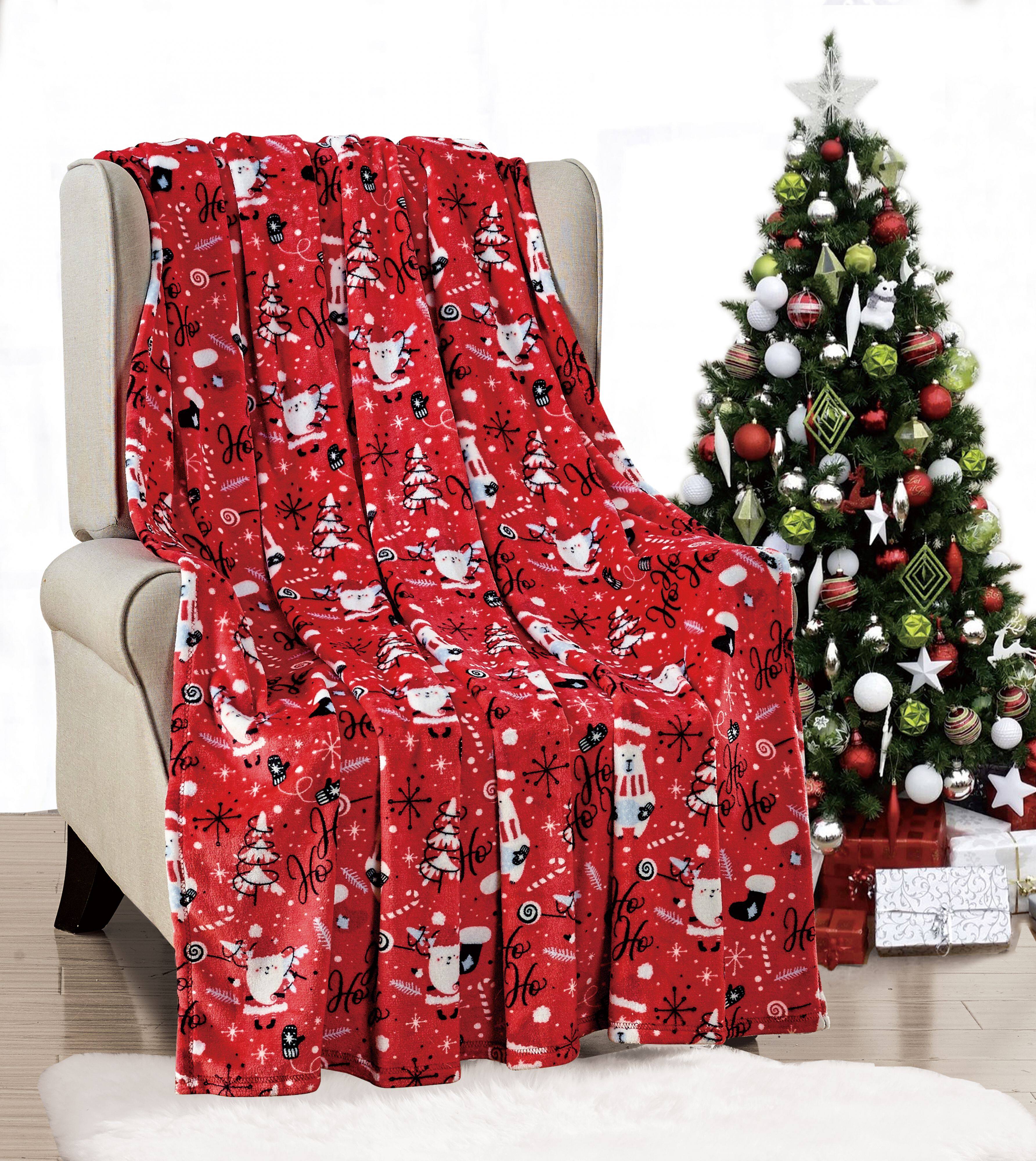 Left. Noble House - Christmas  Festive and Cheery Holiday Super Soft Ultra Comfy Microplush Throw Blanket 50"x60" Red Santa - Red Santa.