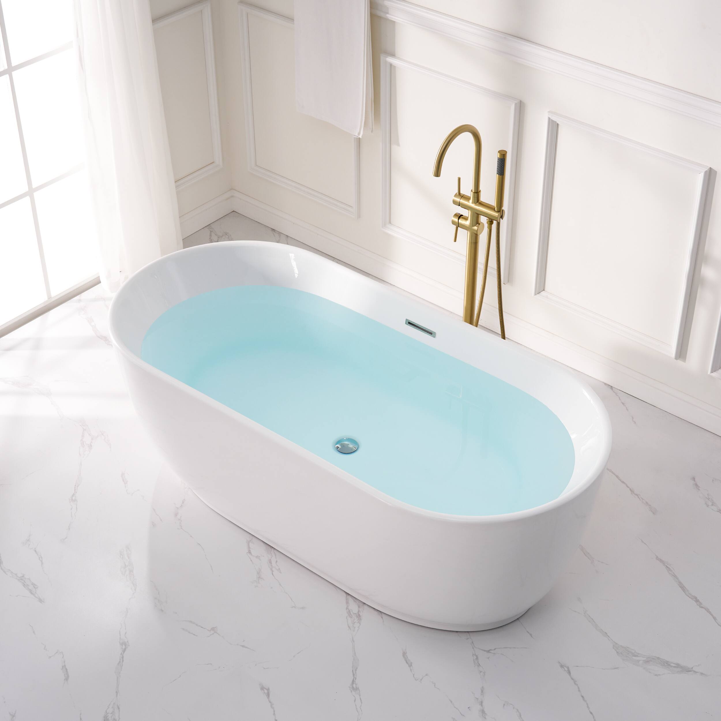 Angle. WELLFOR - Lyra 67 in. x 31.5 in. Pure Virgin Acrylic Oval Freestanding Soaking Bathtub with Drain and Overflow - White.
