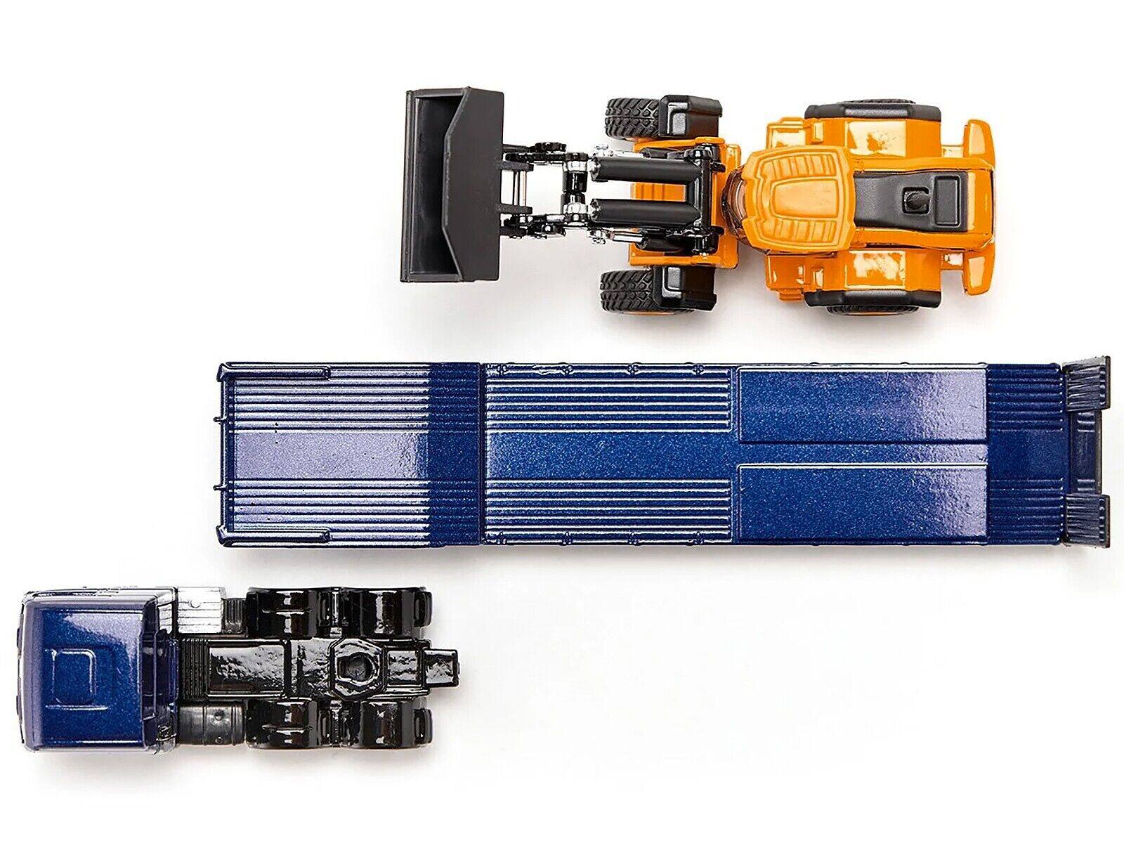 Alt View 1. SIKU - MAN Truck Blue Metallic with Low Loader Trailer and JCB 457 Wheel Loader Yellow 1/87 (HO) Diecast Model by Siku - Blue Metallic.