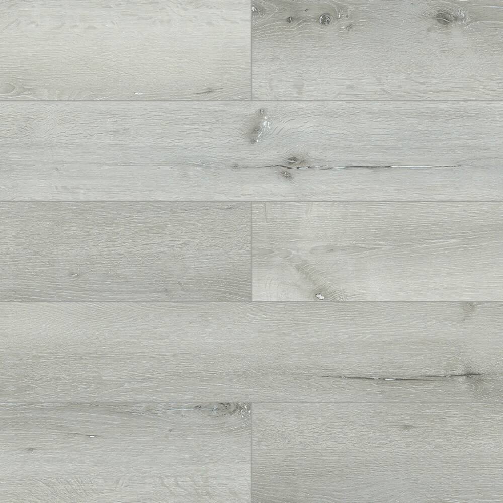 Angle. Dotfloor - 48"x7.2" SPC Composite Flooring; 10 Planks/Box (23.9 sq. ft/Box); 6mm Thick with 1mm IXPE Backing; 20 mil Wear Layer; - Light Oak.