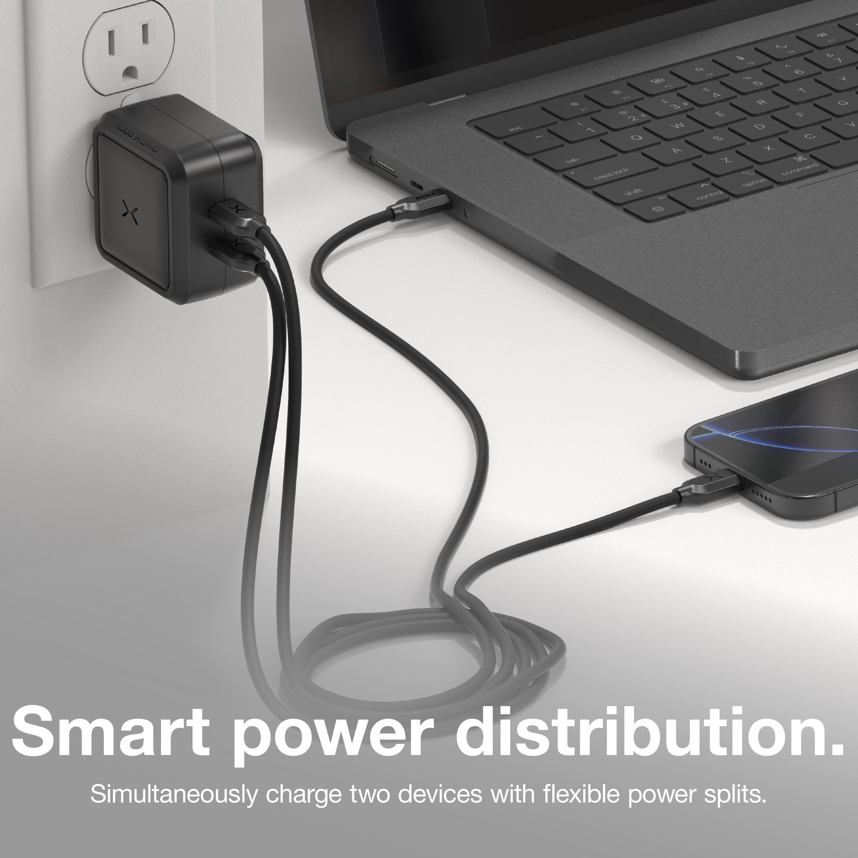 Smart power distribution.  
Simultaneously charge two devices with flexible power splits.