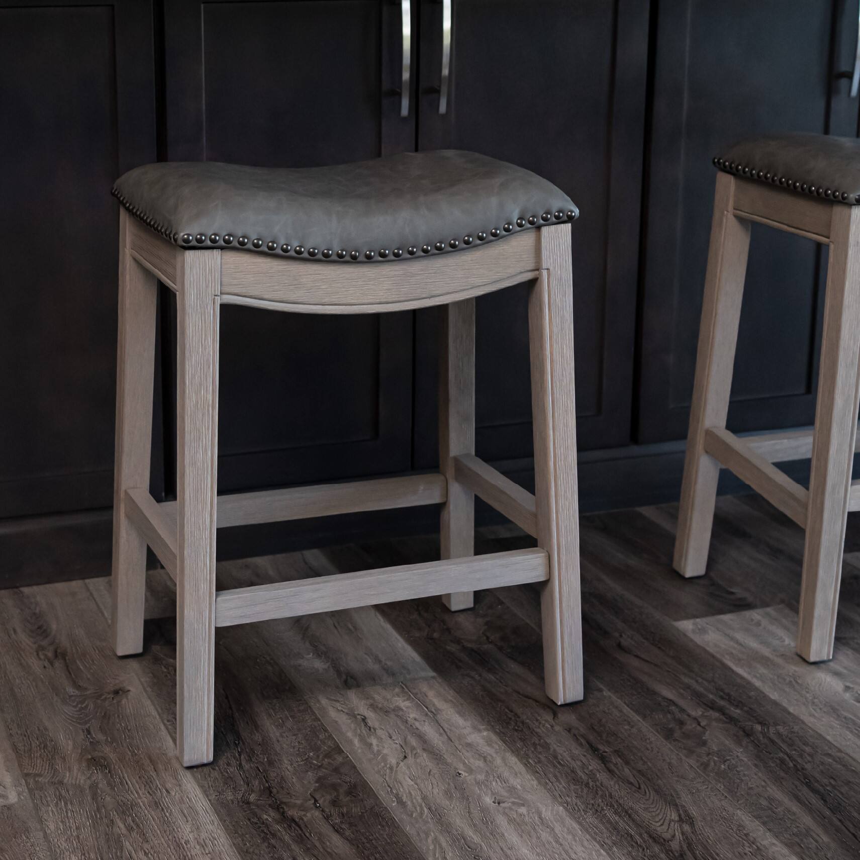 Angle. Maven Lane - 26" Adrien Saddle Counter Stool In Reclaimed Oak With Vegan Leather - Reclaimed Oak.