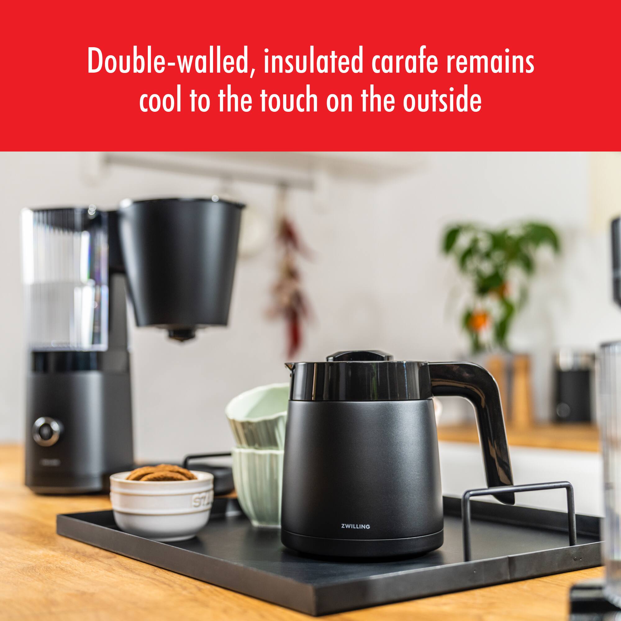 Double-walled, insulated carafe remains cool to the touch on the outside