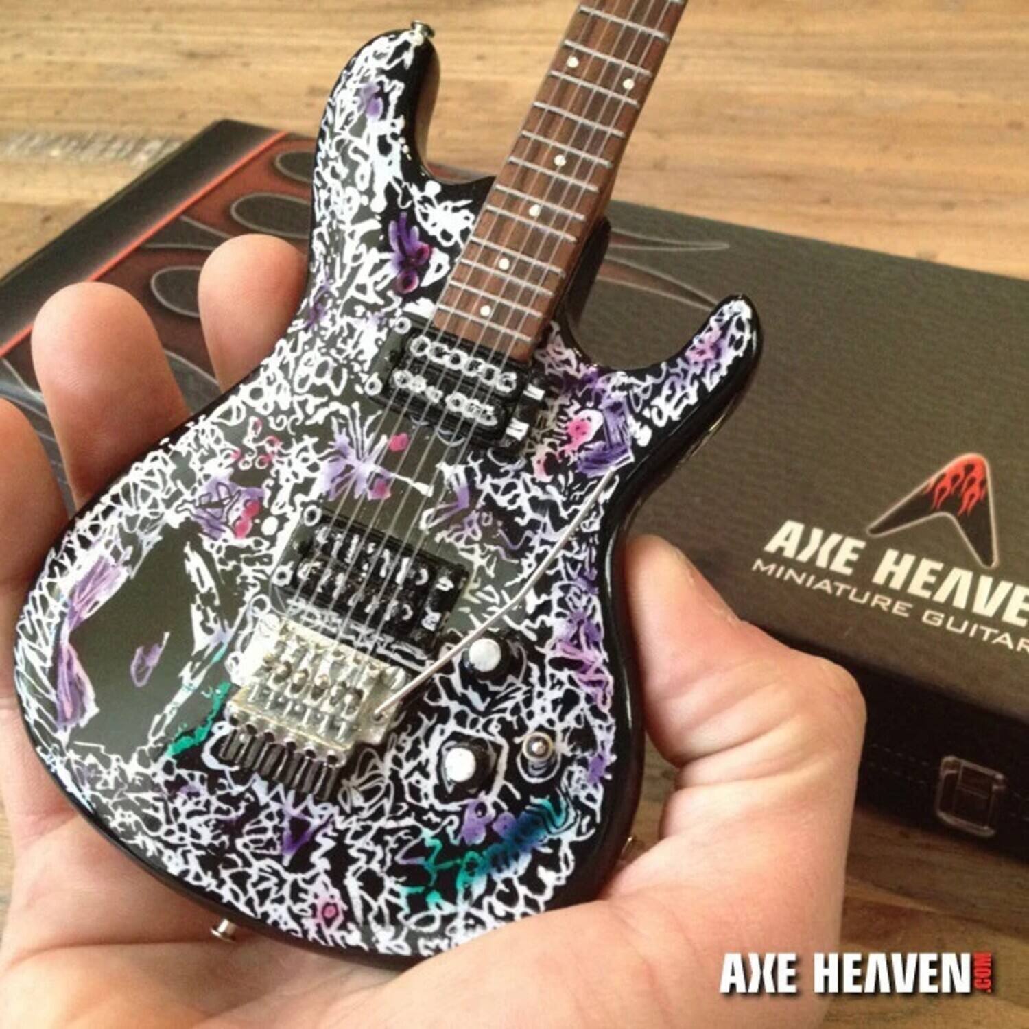 AXE HEAVEN  
MINIATURE GUITAR  
AXEHEAVEN.COM