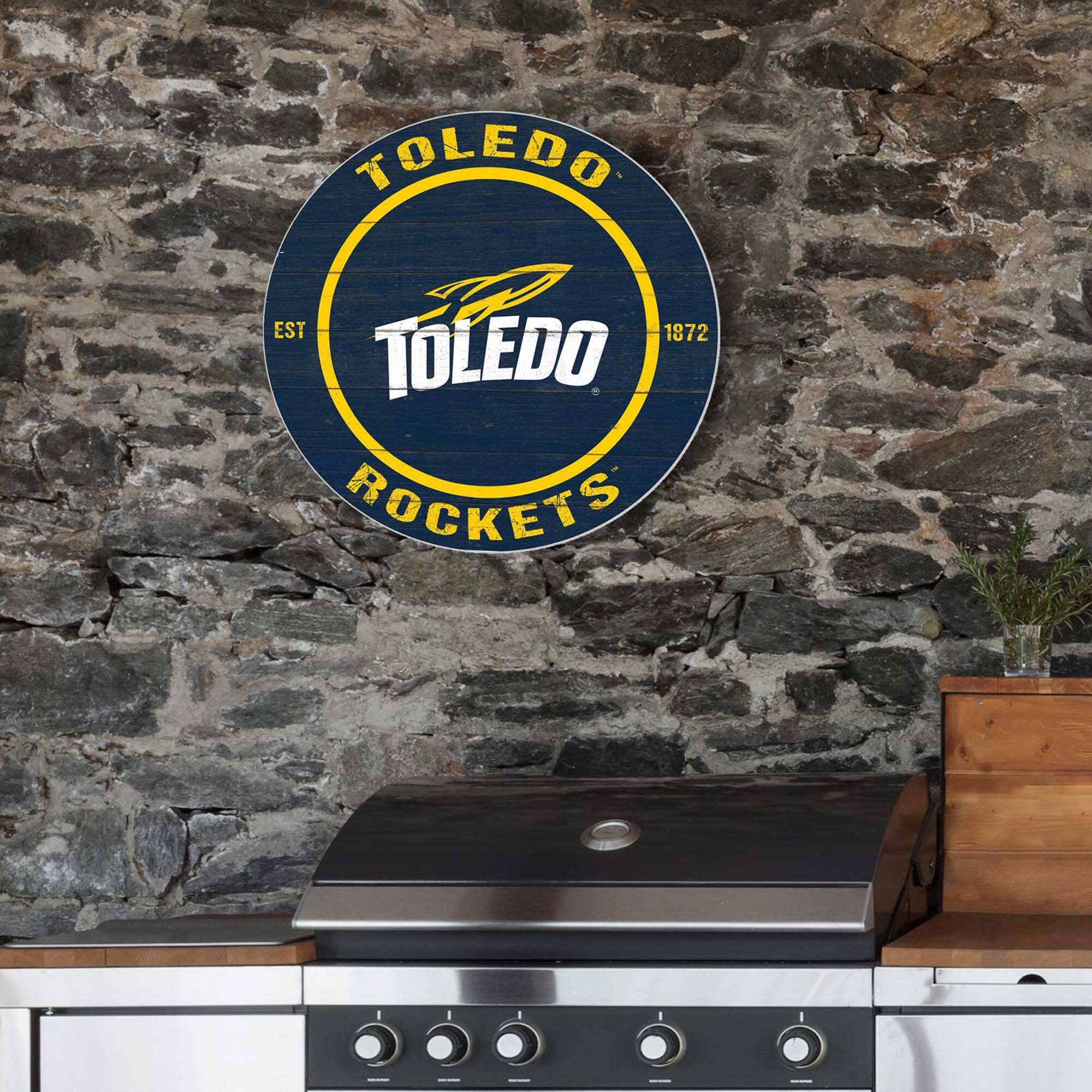 TOLEDO  
EST 1872  
TOLEDO ROCKETS