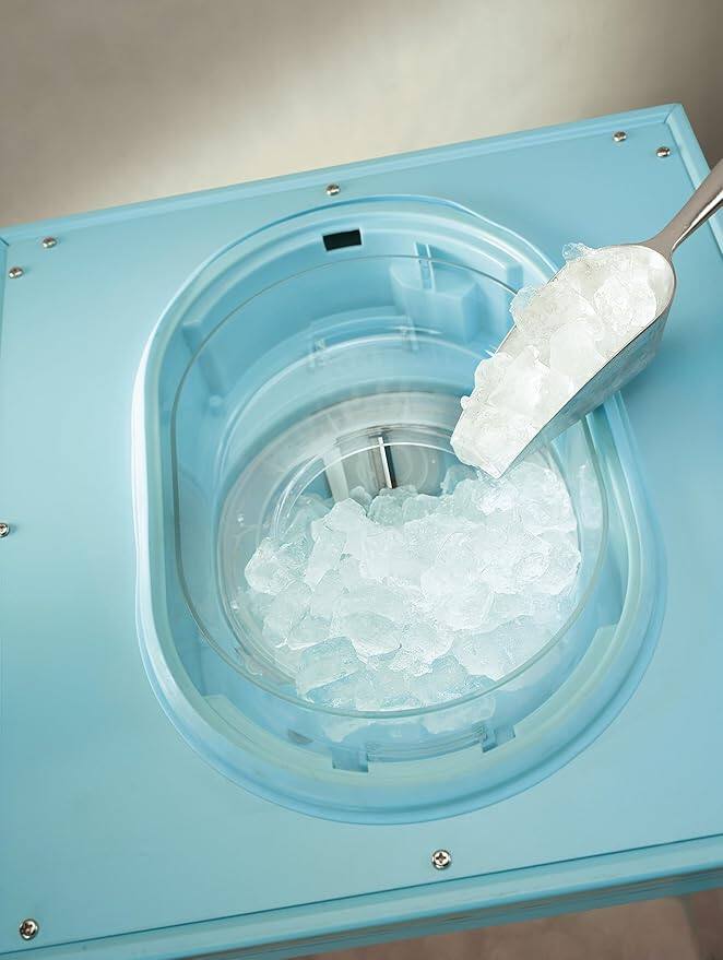 Left. Nostalgia - Nostalgia Shaved Ice Machine with Storage Compartment (Aqua) - Aqua.