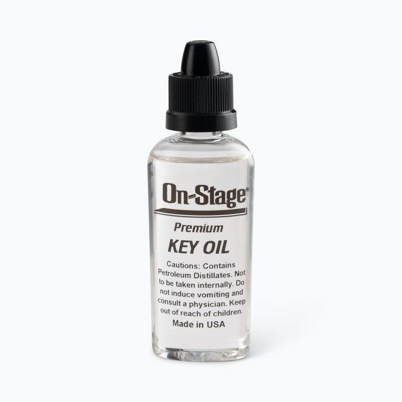On-Stage Premium KEY OIL  
Caution: Contains Petroleum Distillates. Not to be taken internally. Do not induce vomiting and consult a physician. Keep out of reach of children. Made in USA
