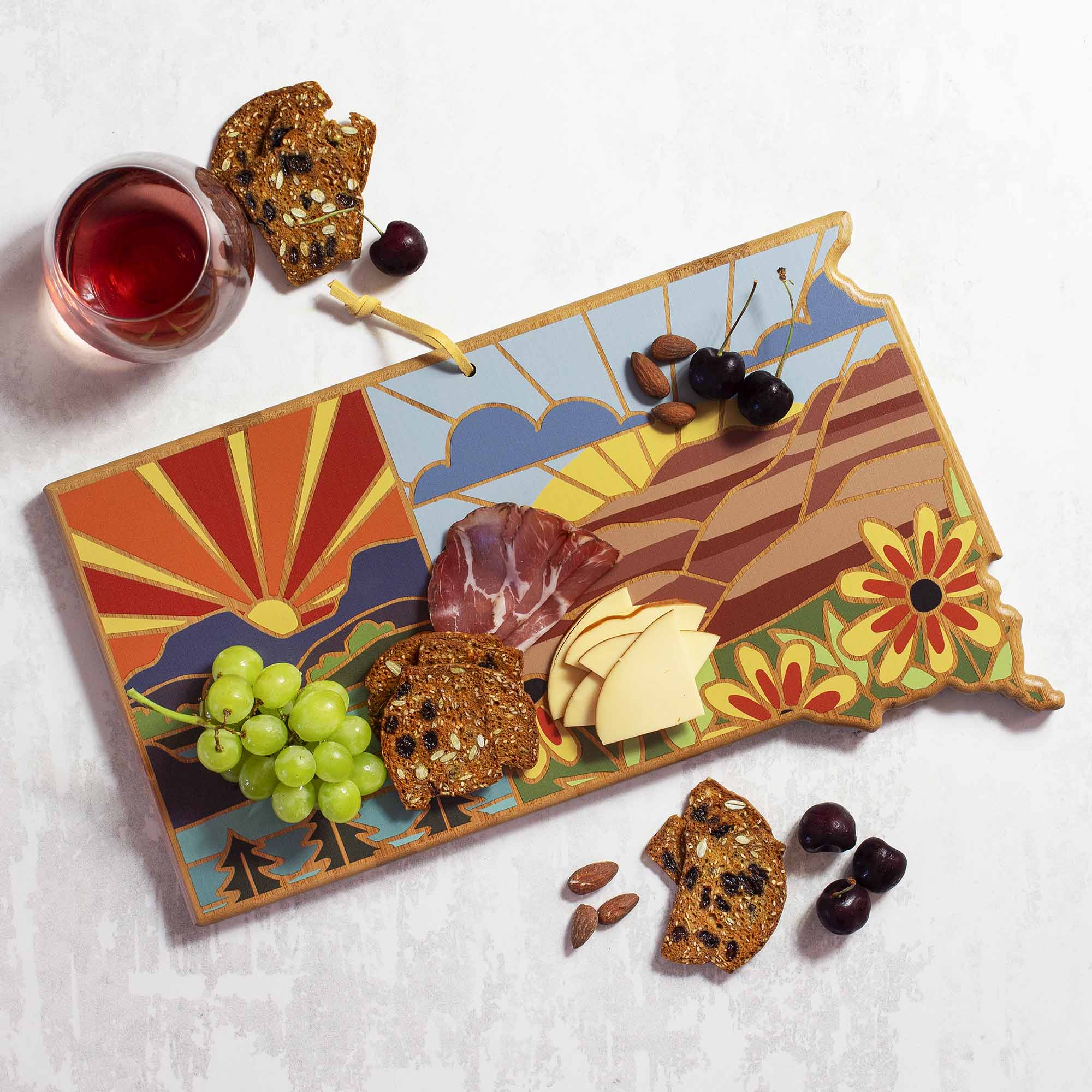 Angle. Totally Bamboo - South Dakota Cutting Board with Artwork by Summer Stokes.