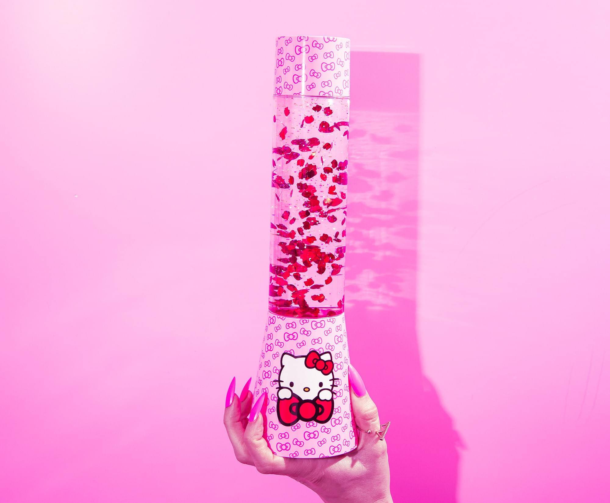 Alt View 5. Ukonic - Sanrio Hello Kitty Glitter Motion Mood Light | 12 Inches Tall - White/Red.