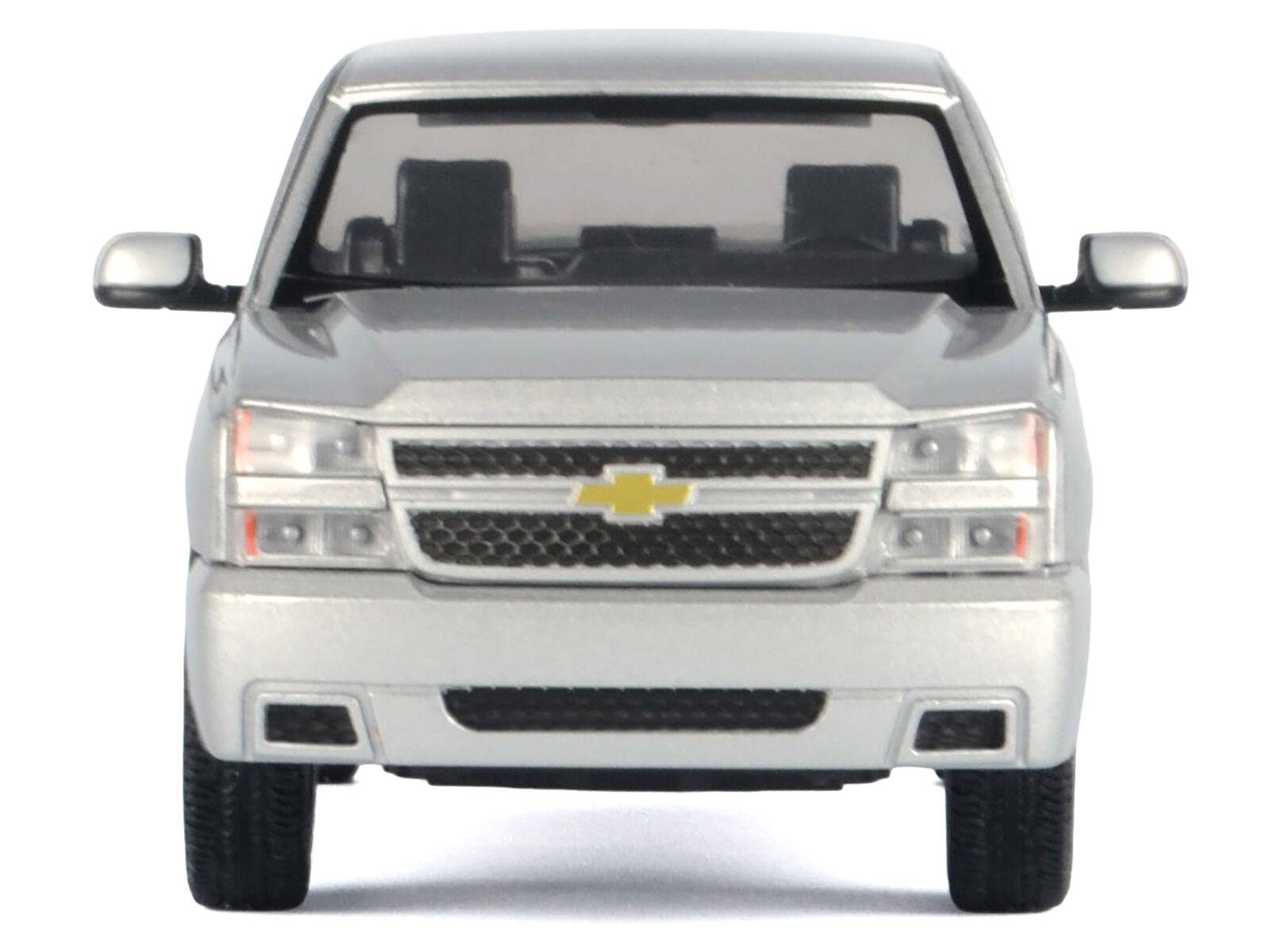 Left. Motormax - 2006 Chevrolet Silverado SS Pickup Truck Silver Metallic "Timeless Legends" Series 1/25 Diecast Model Car by Motormax - Silver Metallic.