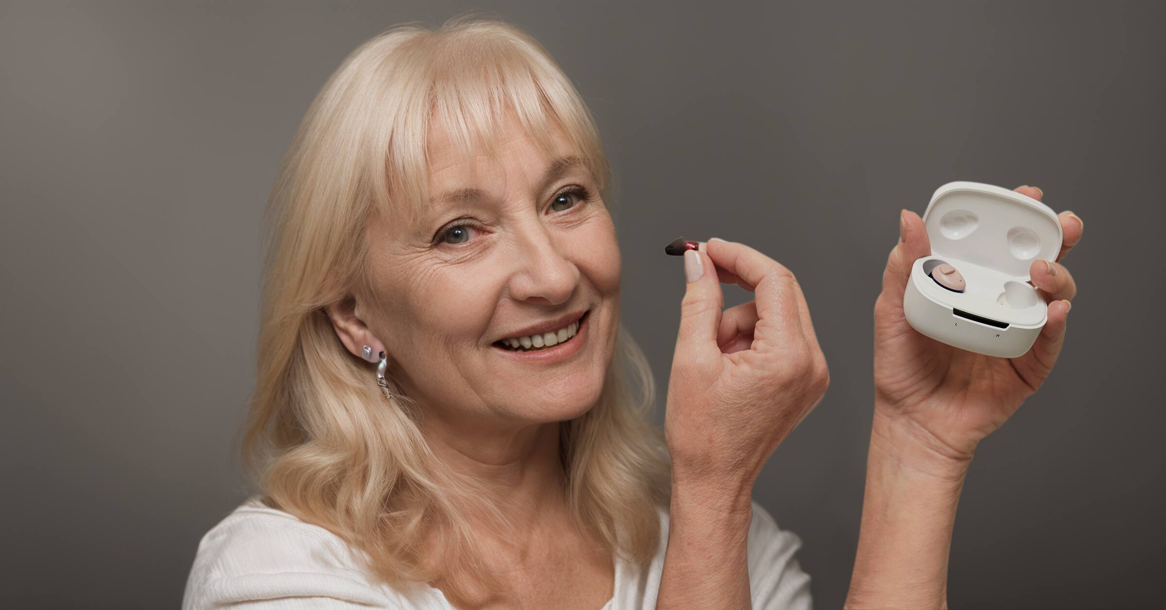 Alt View 8. Ceretone - Torch OTC Hearing Aids – Rechargeable, Wind Noise Reduction, 5 Preset Programs, Lightweight Design - The left is blue.The right is red..