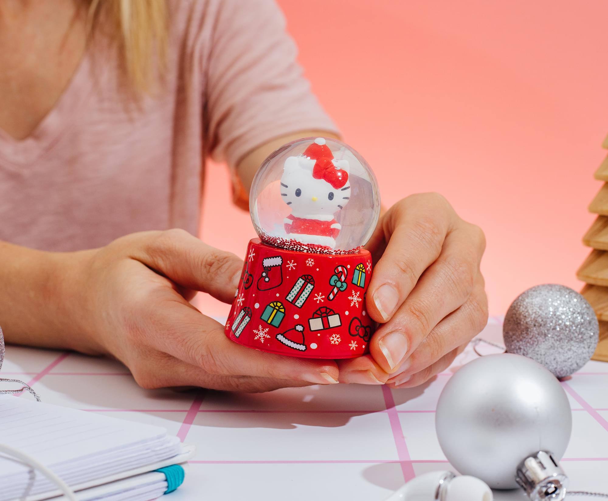 Alt View 2. Silver Buffalo - Sanrio Hello Kitty Holiday 3-Inch Mini Light-Up Snow Globe - Red.