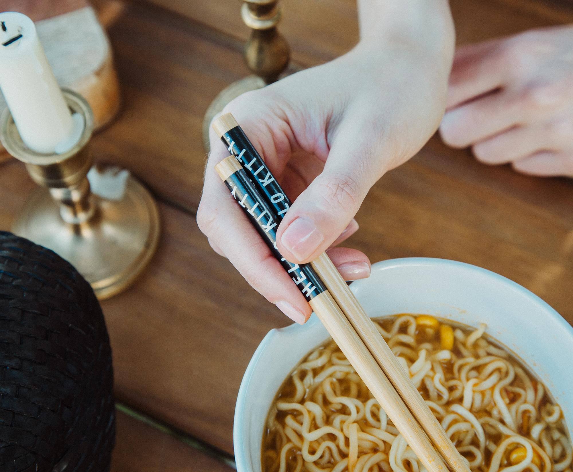 The text on the chopsticks reads: "KITCHEN THINGS"
