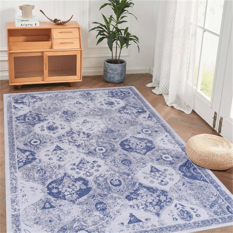 Angle. HTUTWOO - Washable Rug 5x8 - Chenille Area Rug,Machine Washable, Non-Slip TPR Backing,Low Pile 0.14" for Living Room,Kids Friendly - Blue.