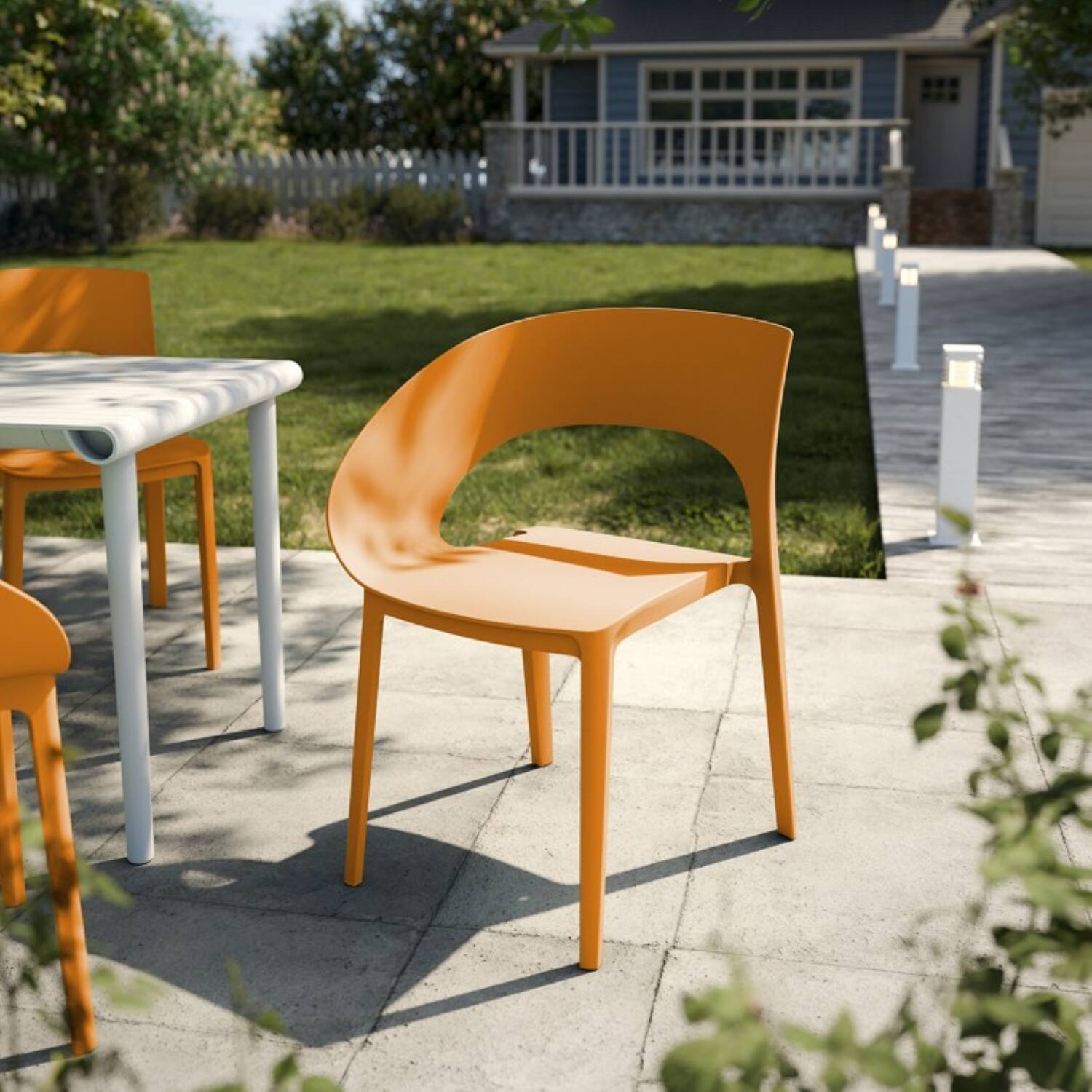Left. Mondawe - Set of 4 Polypropylene Single-Side Chair - Orange.