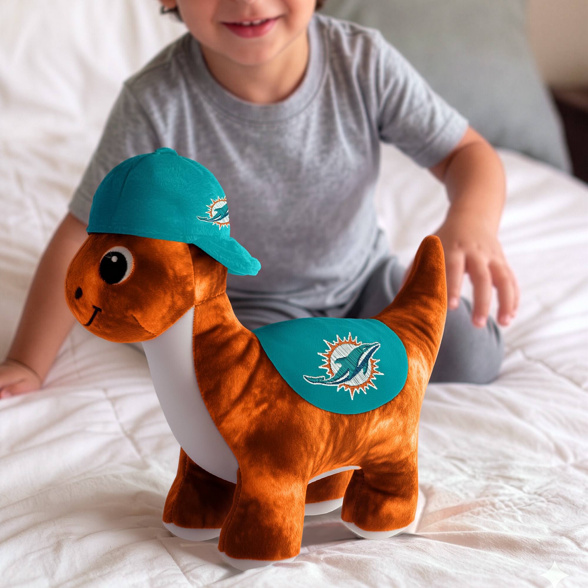 Alt View 2. Sporticulture - Miami Dolphins Huddle Plush Fanasaur - Multicolor.