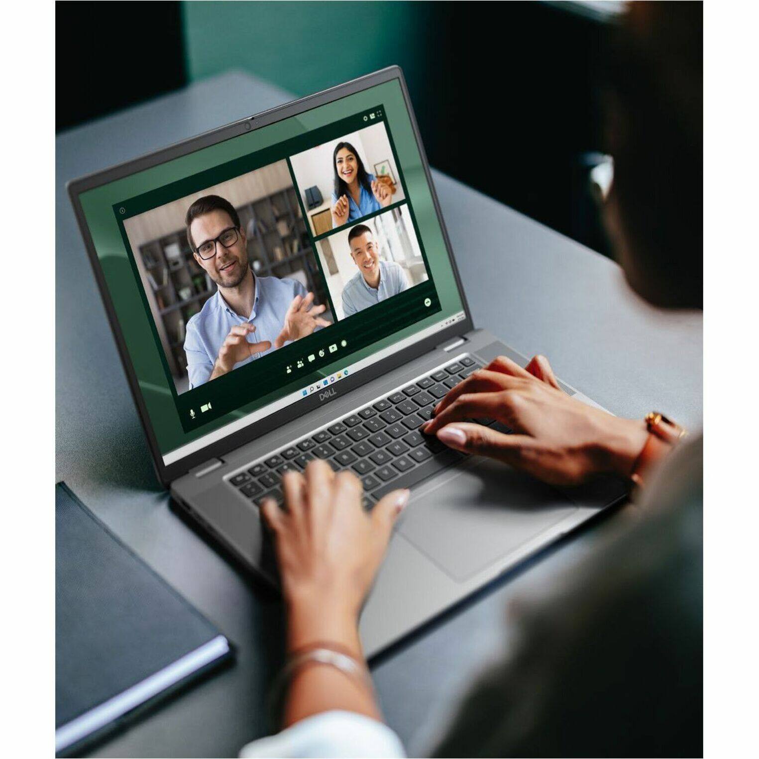 The image features a person using a laptop computer with three different faces displayed on the screen. The laptop is placed on a table, and the person's hand is on the keyboard. The scene suggests that the person is multitasking or comparing different information on the laptop screen.