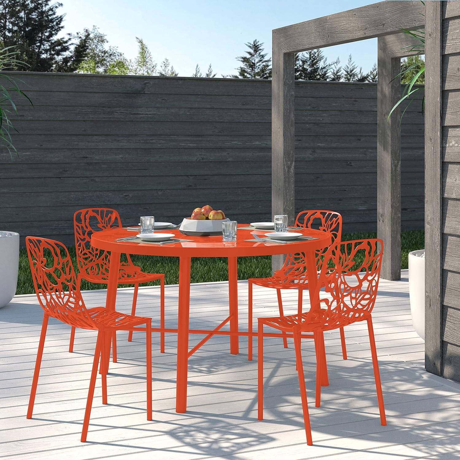 Angle. LeisureMod - Devon (Set of 4) Modern Floral Stackable Aluminum Chair - Weather Resistant Indoor/Outdoor Dining Chair - Orange.