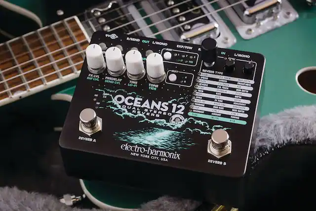 9V R/SEND OUT L/MONO EXP/FSW R. I 2 3 UN L TIDE IN L/MONO BRECET SELECT REVERB ROOM TYPE FX LVL INF A SPRING P.D. FBACK LVL SEND PREDELAY PLATE LENGTH MOD DEPTH LVL TIME P.D. PREAMP LO-FI TONE REVERSE FBACK DRIVE TIDE ECHO P.D. FBACK SIZE TREM FEEDBACK MOD DEPTH MOD RATE DELAY INF S/R DEPTH DYNA RATE AUTO-INF FX TIME DEPTH TAP OCEANS DUAL STEREO 12 RESONANT POLY SHIMMER CTRL MOD XFADE TIME RATE TIME MOD SENSITIVITY SENSITIVITY DEPTH REVERB DUAL AMOUNT CTRL 2 SRS/PRL TUNING A--B REVERB A electro-harmonix NEW YORK CITY, USA REVERB