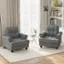 I cannot understand the text you provided. It appears to be unrelated to the image of the two grey chairs in the living room.