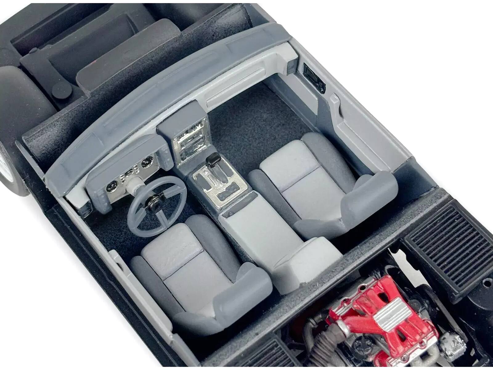 Left. Revell - Level 4 Model Kit 1985 Pontiac Fiero GT 1/24 Scale Model by Revell - White.