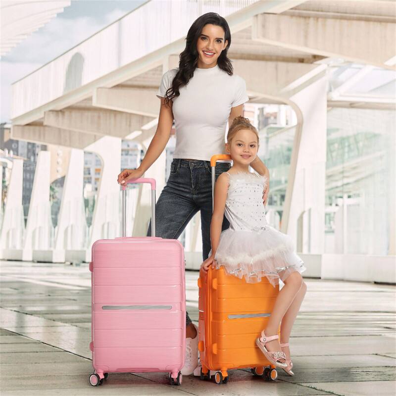 Angle. HTUTWOO - Luggage Sets 4 Piece (14/20/24/28) - PP Lightweight and Expandable Suitcase with TSA Lock, Spinner Wheels - Pink.