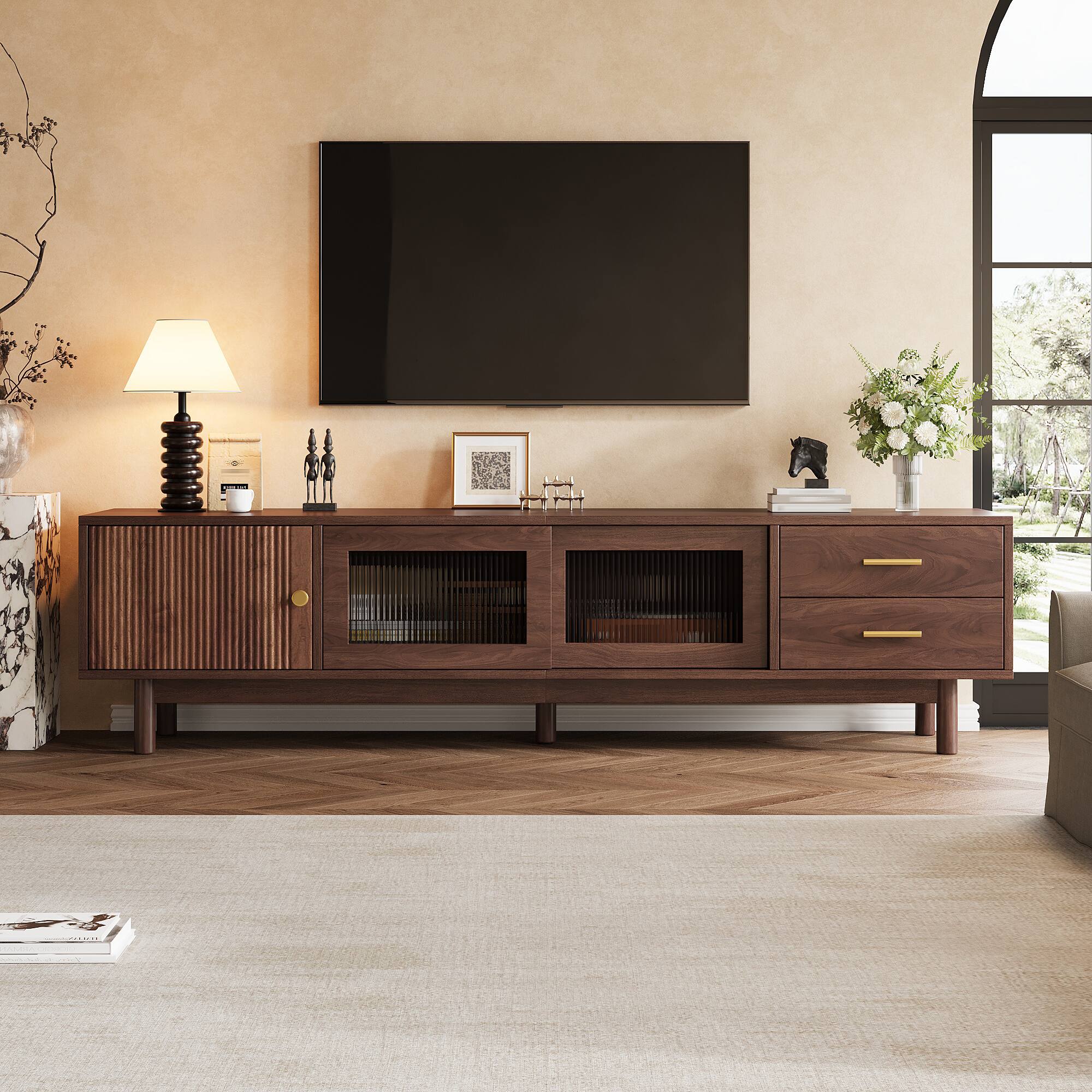 Left. MERAVOM - Mid Century Modern TV Stand for 80" TVs, Entertainment Center with Glass Sliding Doors and 2 Drawers for Living Room - Walnut.