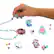 Back Zoom. Tara Toys - Gabby's Dollhouse DIY Necklace Activity Set with Charms & Beads, Kids Ages 3+.