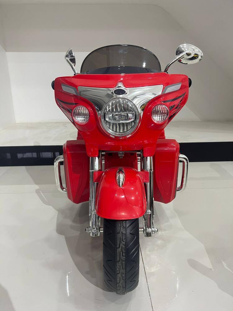 Angle. BreeBe - 12V Kids Electric Ride-On Motorcycle, Two Seats, Key Start, 3 Wheels, Headlight, Storage Box, Dual Motors - Red.