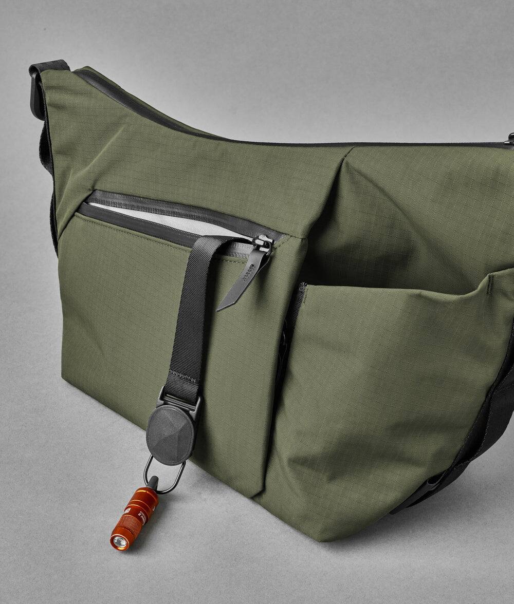 Alt View 4. ALPAKA - Flow Satchel 4L Crossbody Bag, Water Resistant Shoulder Bag, Expandable Bottle Pocket, YKK Zippers - Green Axoflux 210D.