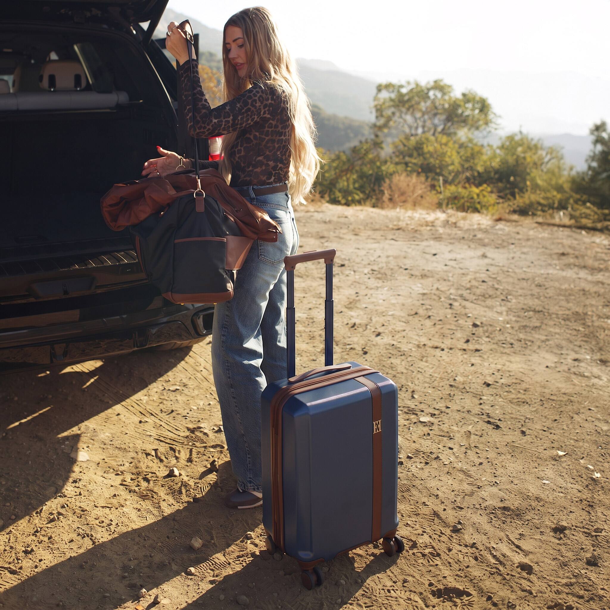Angle. Elle - ELLE Luxe Journey Expandable Retro Spinner Carry-on Suitcase | Navy - Navy.