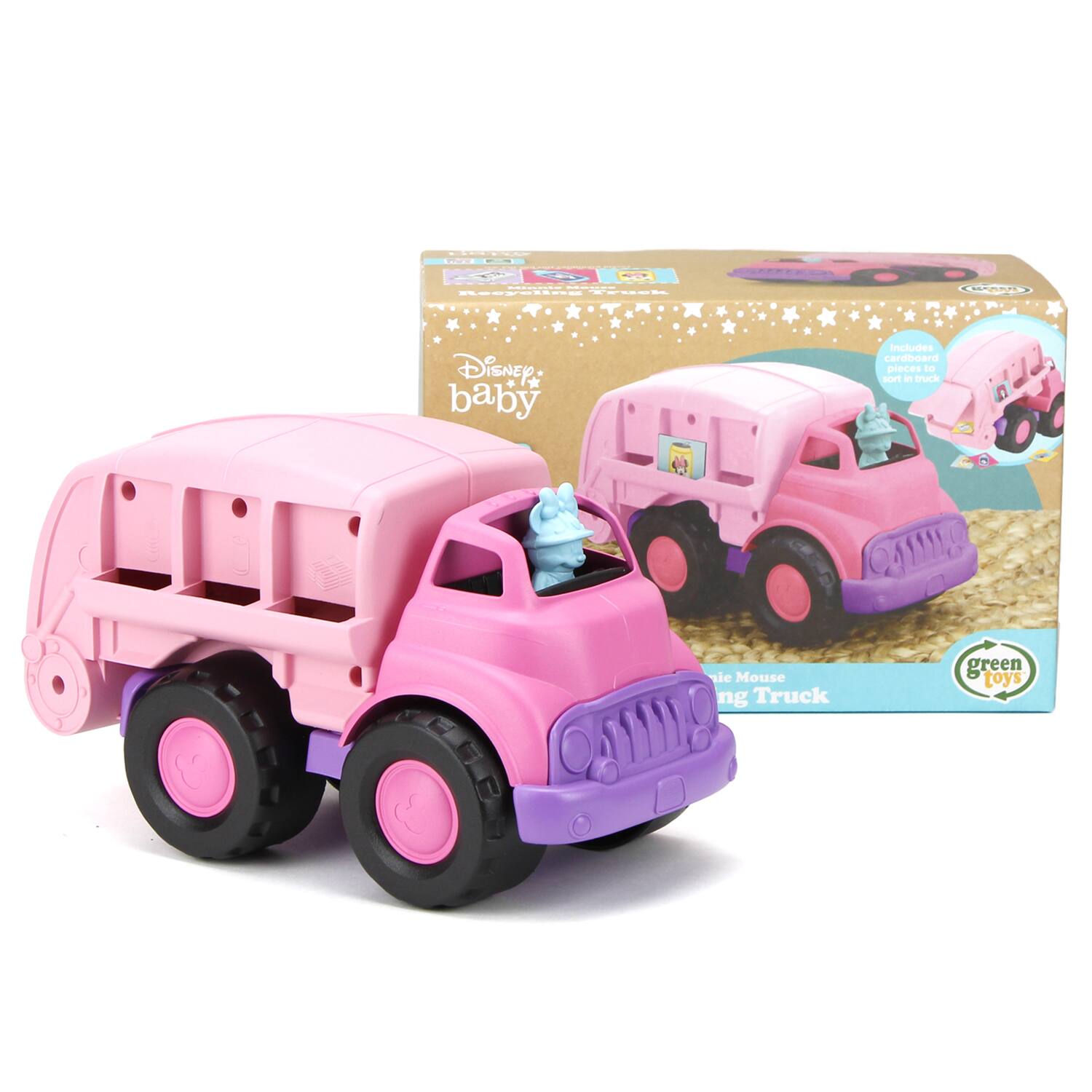 The image features a pink toy truck, which is part of the Disney Baby line. The toy truck is shown in a box, and there is also a pink toy car included in the set. The box contains cardboard pieces to sort, and the toys are made by the company Green Toys.