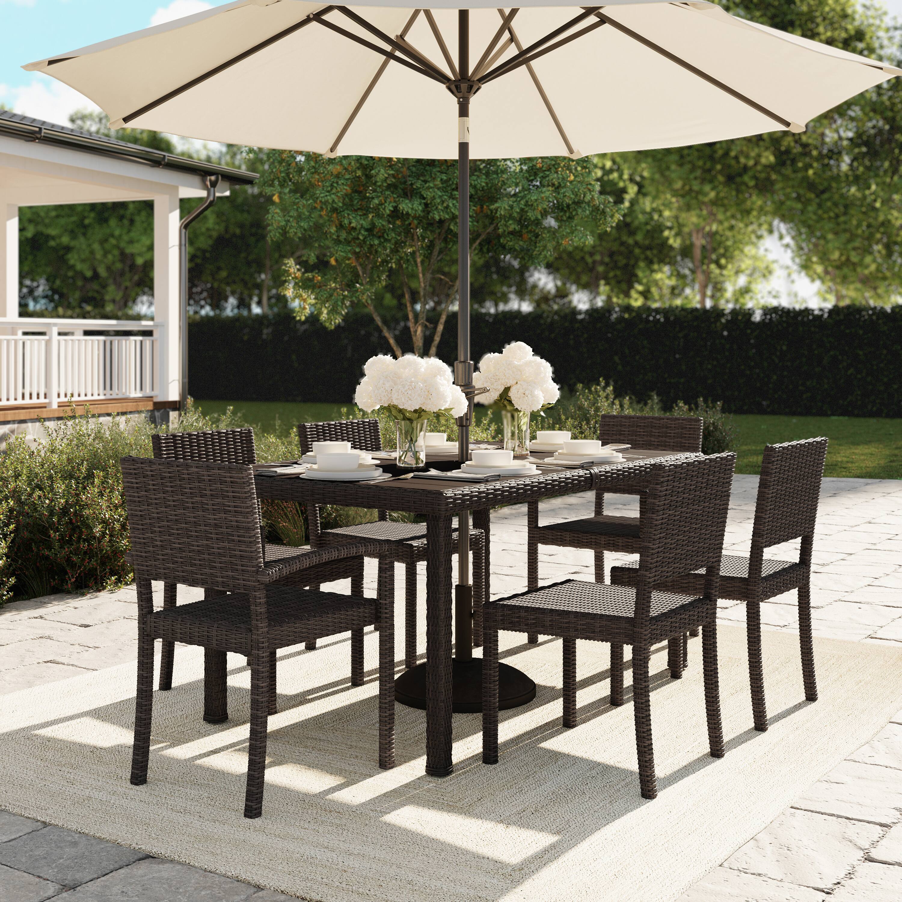 Alt View 1. Martha Stewart - Bedford 7pc Outdoor Rattan Wicker Patio Dining Set with 6 Stack Chairs and 62" Table - Brown.