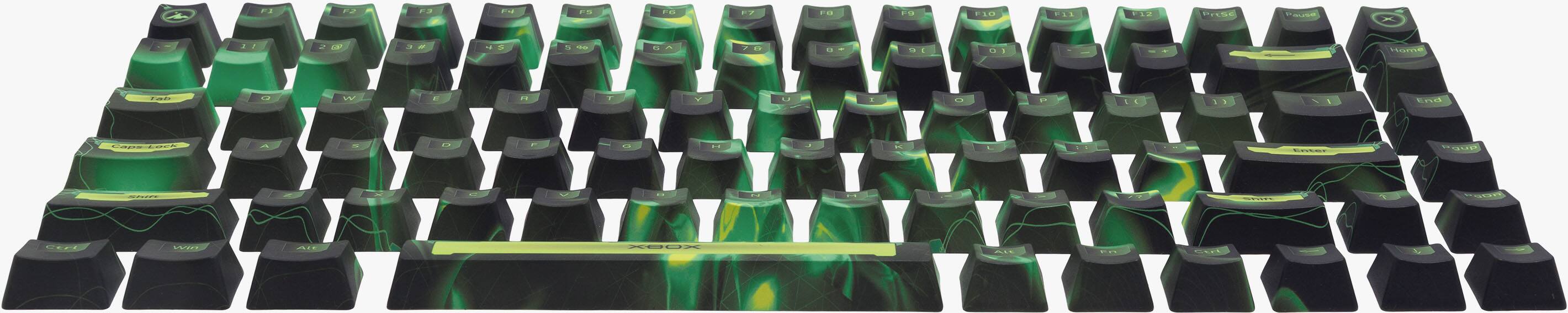 Sure, here is the corrected and grouped text from the image:

- F1
- F2
- F3
- F4
- F5
- F6
- F7
- F8
- F9
- F10
- F11
- F12
- PrtSc
- Pause
- Tab
- Q
- W
- E
- R
- T
- Y
- U
- I
- O
- P
- [ {
- ] }
- Caps Lock
- A
- S
- D
- F
- G
- H
- J
- K
- L
- ; :
- ' "
- Shift
- Z
- X
- C
- V
- B
- N
- M
- , <
- . >
- / ?
- Ctrl
- Win
- Alt
- Space
- Home
- End
- Enter
- Backspace
- Xbox

The text "Xbox" is on the spacebar.