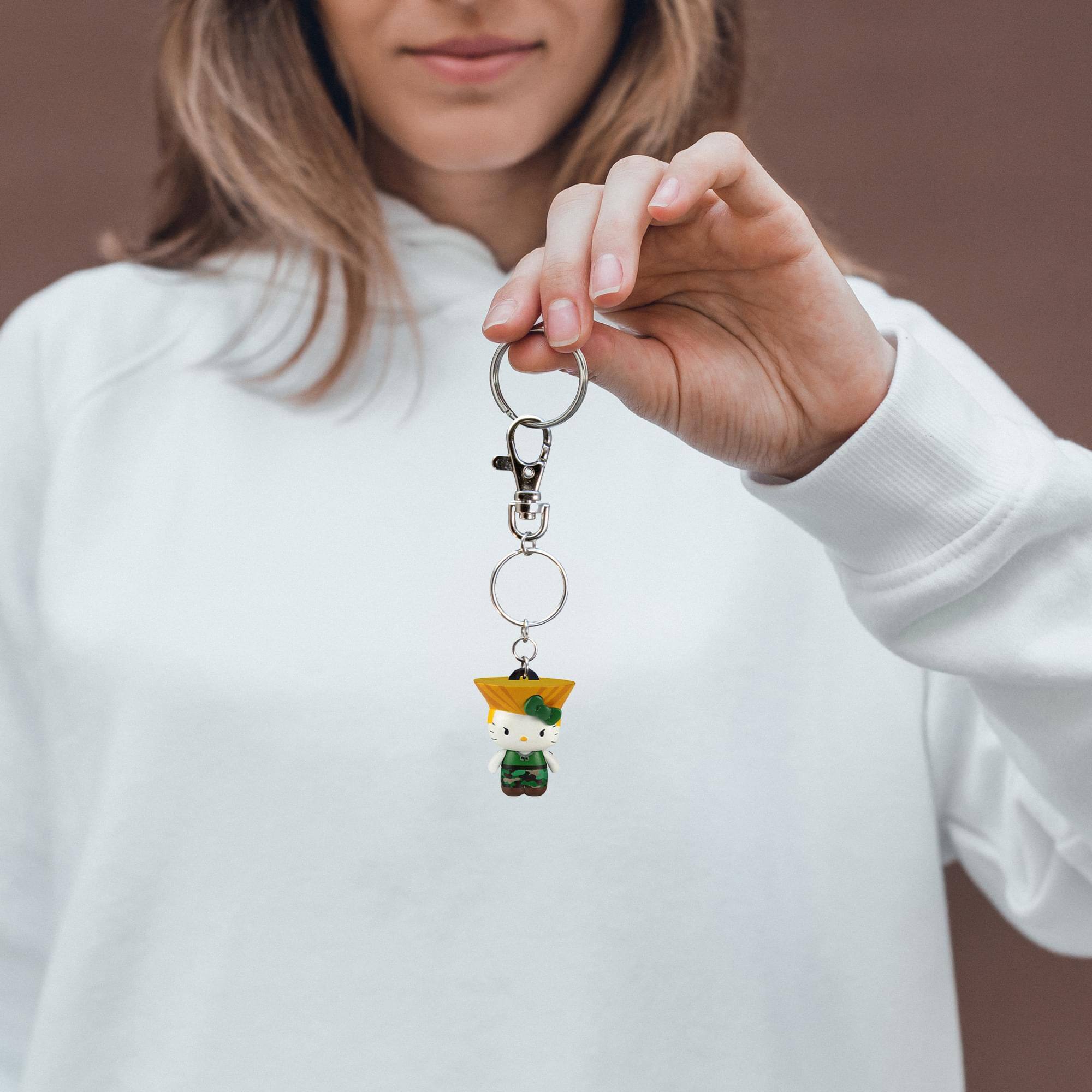 Alt View 10. Toynami - Street Fighter X Sanrio Mobile Key Chain Guile - Multicolored.