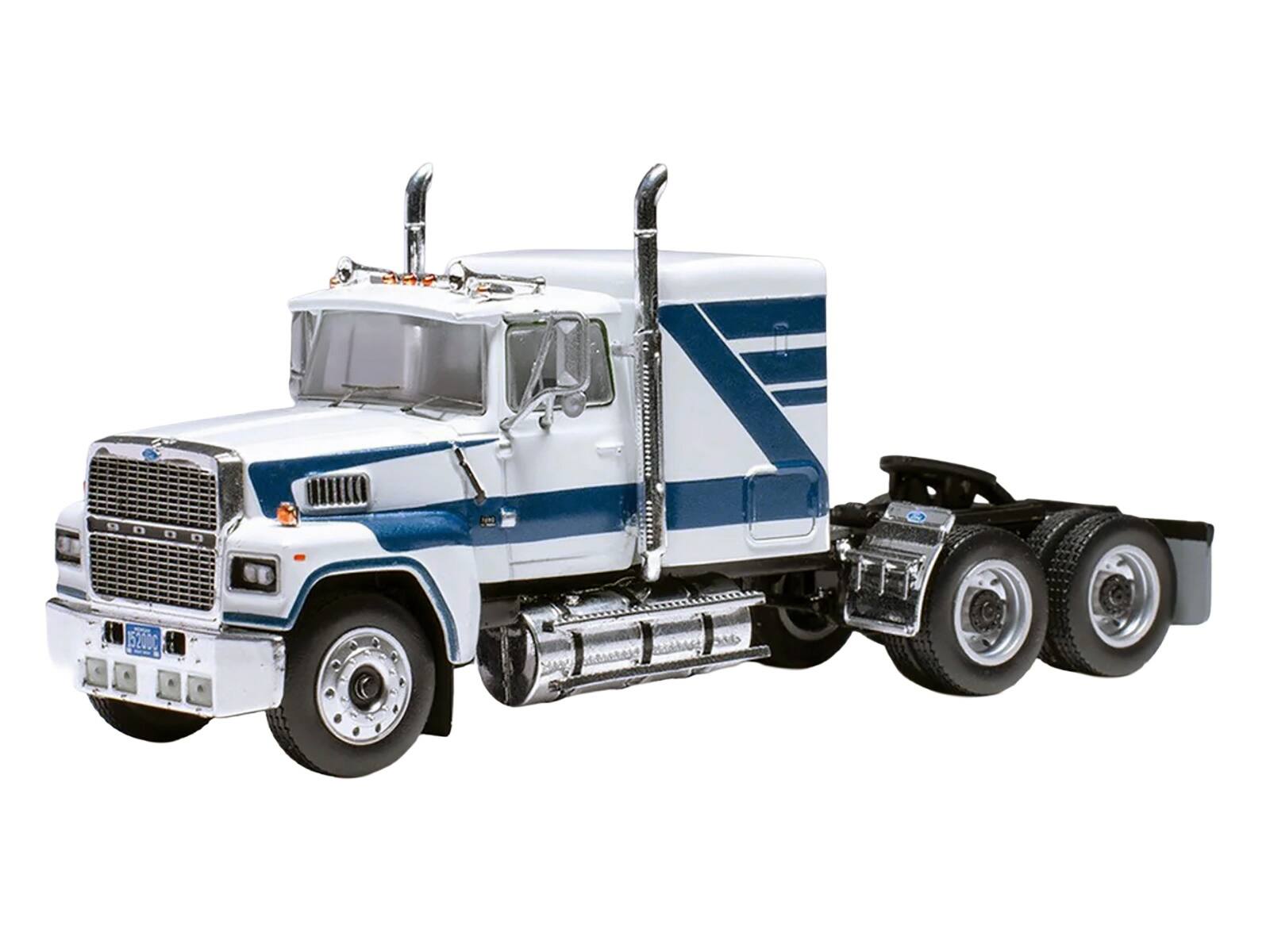 Angle. IXO - 1978 Ford LTL 9000 Truck Tractor White with Blue Stripes 1/64 Diecast Model by IXO Models - White and Blue.