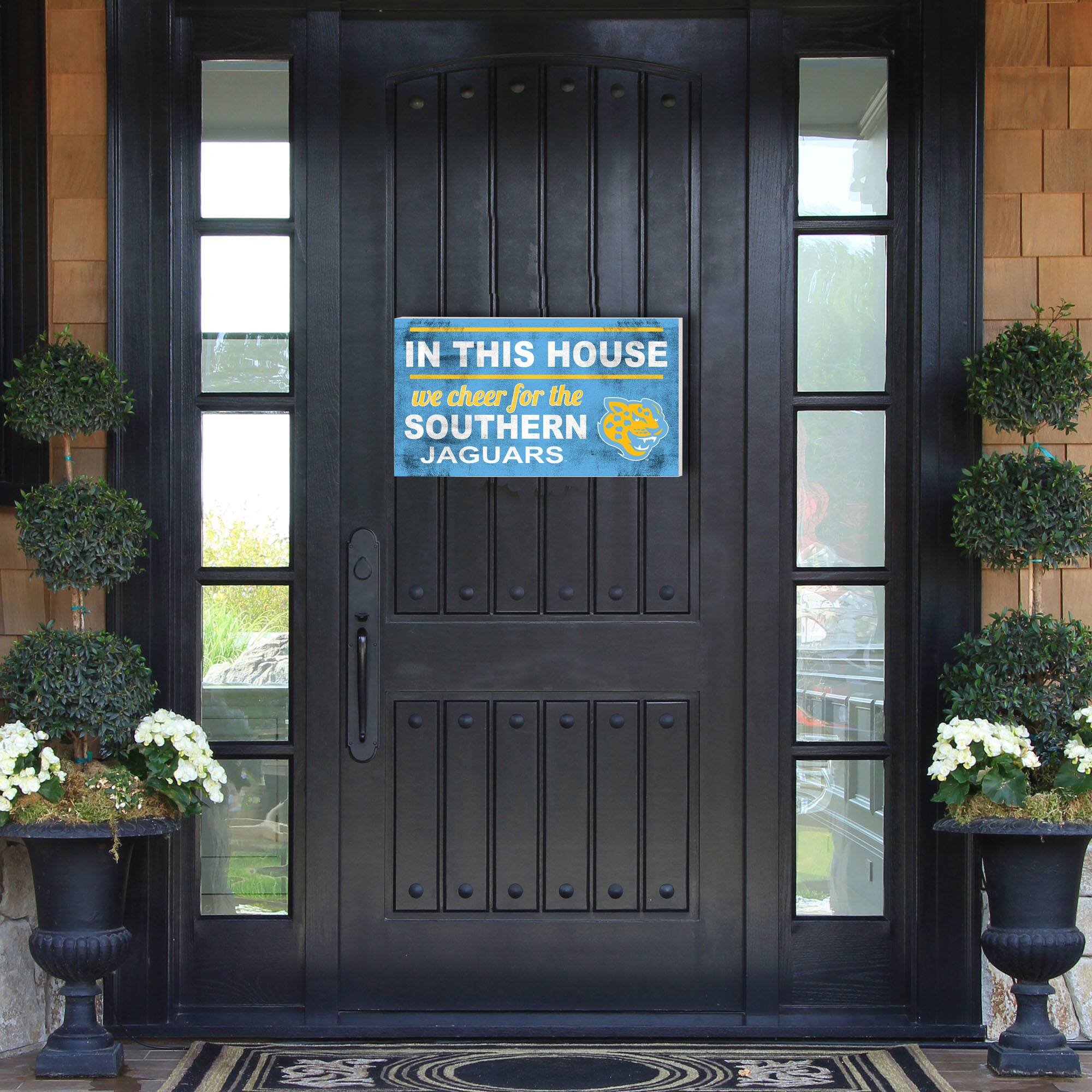 IN THIS HOUSE  
we cheer for the  
SOUTHERN JAGUARS