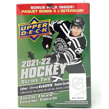 BONUS PACK INSIDE!
PAQUET BONIS À L'INTÉRIEUR!
UPPER D.E.C.K
BUER
2021-22 HOCKEY
Series Two
Rookie Cards
Young Guns
Jeunes Loups
Collectez les cartes de recrues
Collectionnez les cartes de recrues
8 Cards per Pack • 6 Packs per Box
8 Cartes par Paquet • 6 Paquets par Boîte
OFFICIAL
LICENSED PRODUCT
BB11539137
MAY CONTAIN TIME-SENSITIVE REDEMPTIONS
PEUT CONTENIR DES CARTES DE RACHAT AVEC DATE D'ÉCHANGE