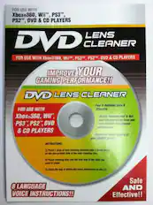 FOR USE WITH Xbox360, Wii, PS3, PS2, DVD & CD PLAYERS
LENS CLEANER
IMPROVE YOUR GAMING PERFORMANCE!!
DVD LENS CLEANER
FOR USE WITH Xbox360, Wii™, PS3™, PS2™, DVD & CD PLAYERS
Fast & Reliable! Safe & Effective!
Gently removes dust & dirt and static from your DVD/CD players
INSTRUCTIONS:
1) Place 1 drop of less cleaning solution on the non-printed side of the cleaning disc
2) Place cleaning disc into the disc tray of the item you want to clean
3) Close the tray & follow the voice instructions on the CD
8 LANGUAGE VOICE INSTRUCTIONS!!
Safe AND Effective!!