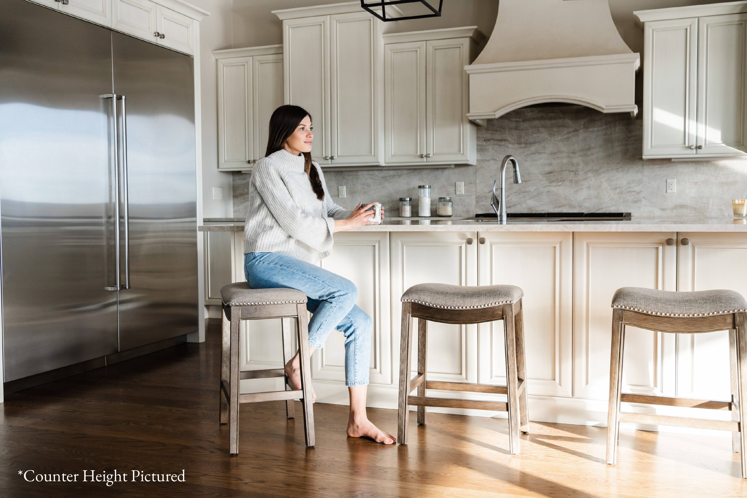 The text on the image is: "*Counter Height Pictured"