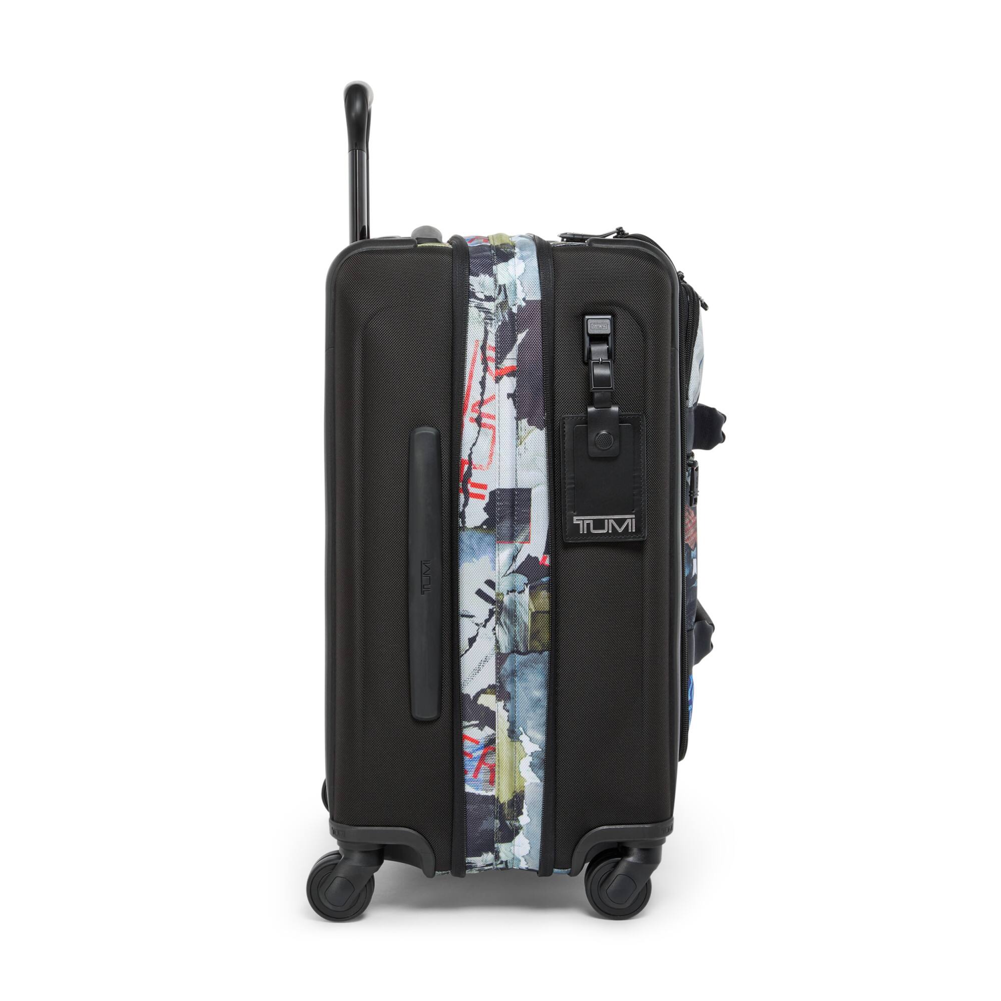 Left. TUMI - Alpha International 22" with New Face Carry On Suitcase - Wheatpaste Print.