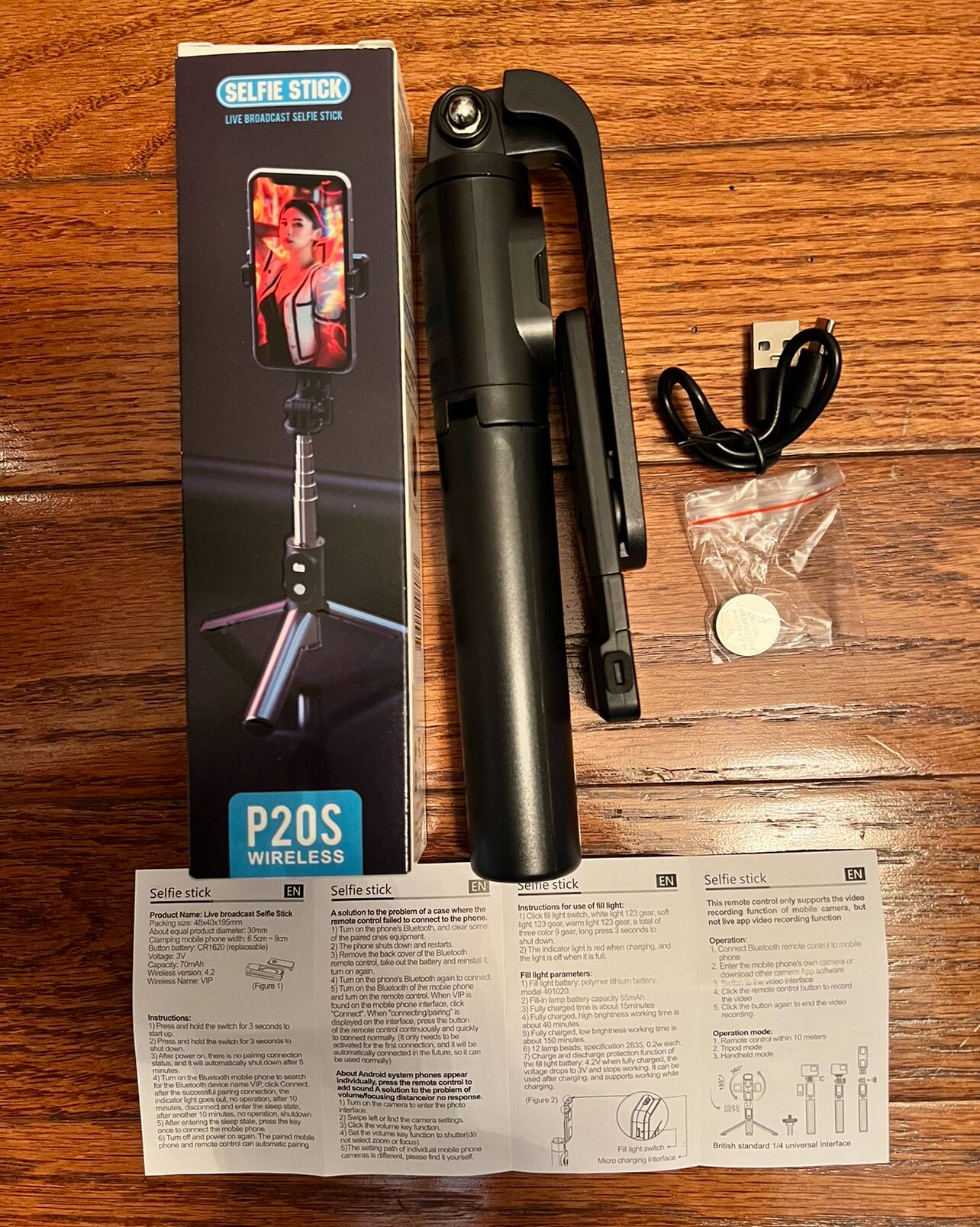 **SELFIE STICK**  
LIVE BROADCAST SELFIE STICK  

**P20S**  
WIRELESS  

---

**Selfie stick**  
EN  

**Product Name**  
Live Broadcast Selfie Stick  

**Packing size**  
450*150*15mm  

**Clamping mobile phone**  
5.5-8.5cm  

**Battery**  
CR2032 (rechargeable)  

**Wireless**  
VIP  

**Instructions:**  

1. Press and hold the switch for 3 seconds to turn on the selfie stick.  
2. Press and hold the switch for 3 seconds to turn off the selfie stick.  
3. After power on, there is no pairing connection.  
4. Turn on the Bluetooth of the mobile phone to search for the device named "Selfie Stick".  
5. After successful pairing, the indicator light will flash.  
6. If the indicator light stops flashing, it means the connection is successful.  
7. The selfie stick will automatically shut down after 10 minutes of inactivity.  

---

**Selfie stick**  
EN  

**A solution to the problem of a case where the phone's Bluetooth is turned on,