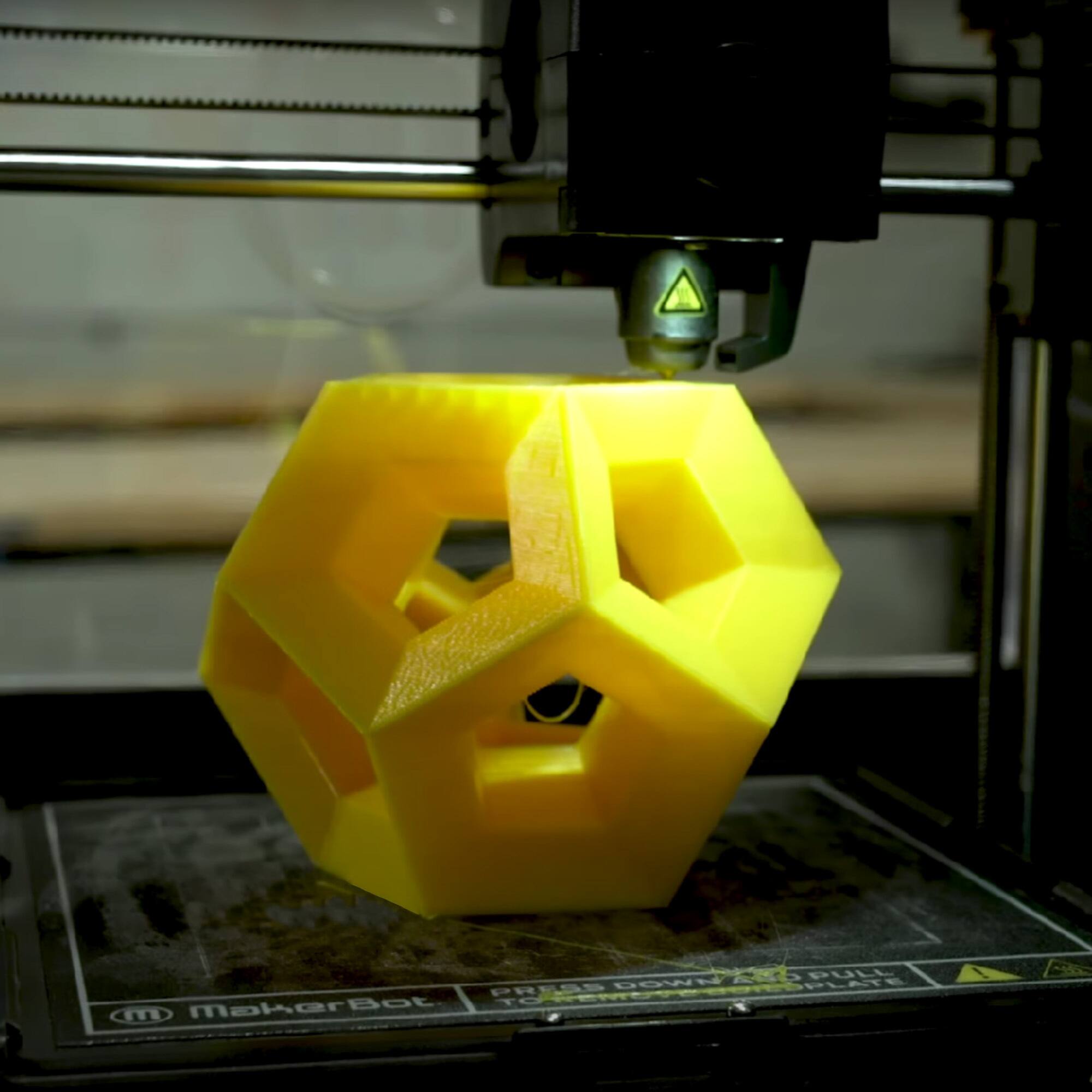 PRESS DOWN MakerBot TO PULL PLATE