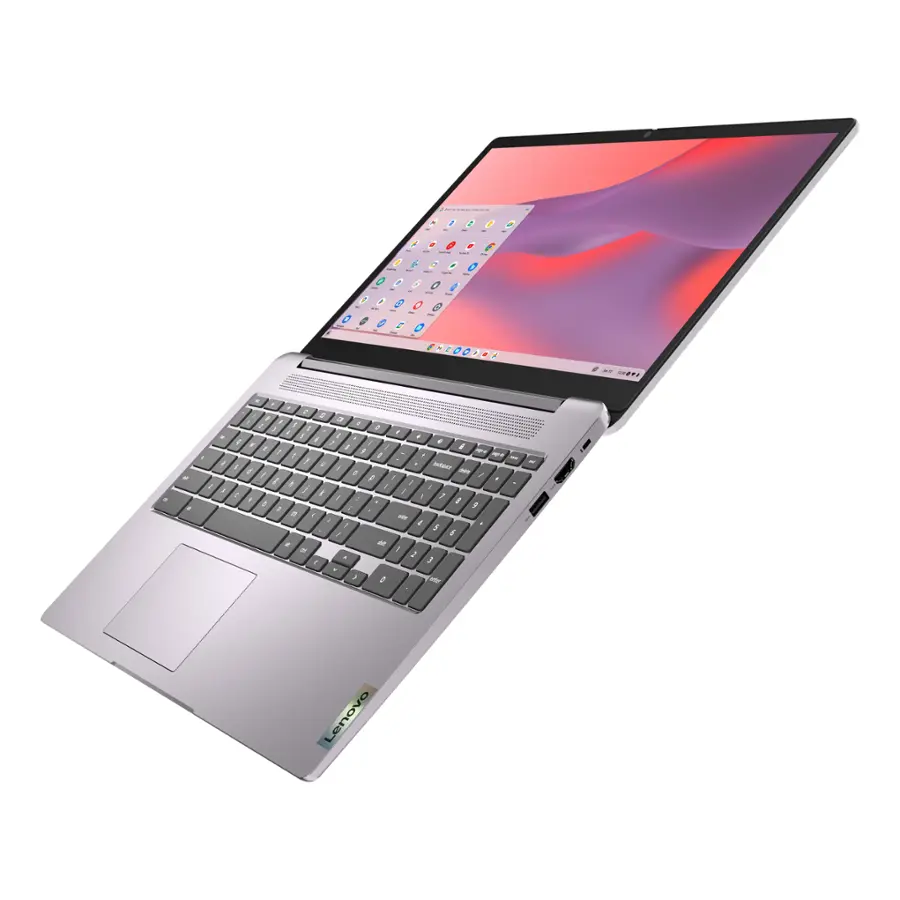 The image features a laptop computer with a silver case and a red background. The laptop is open and ready for use, with the screen displaying a variety of icons. The keyboard is visible, and the laptop appears to be a Lenovo product. The laptop is positioned in a way that showcases its design and features, making it an appealing image for promotional or educational purposes.